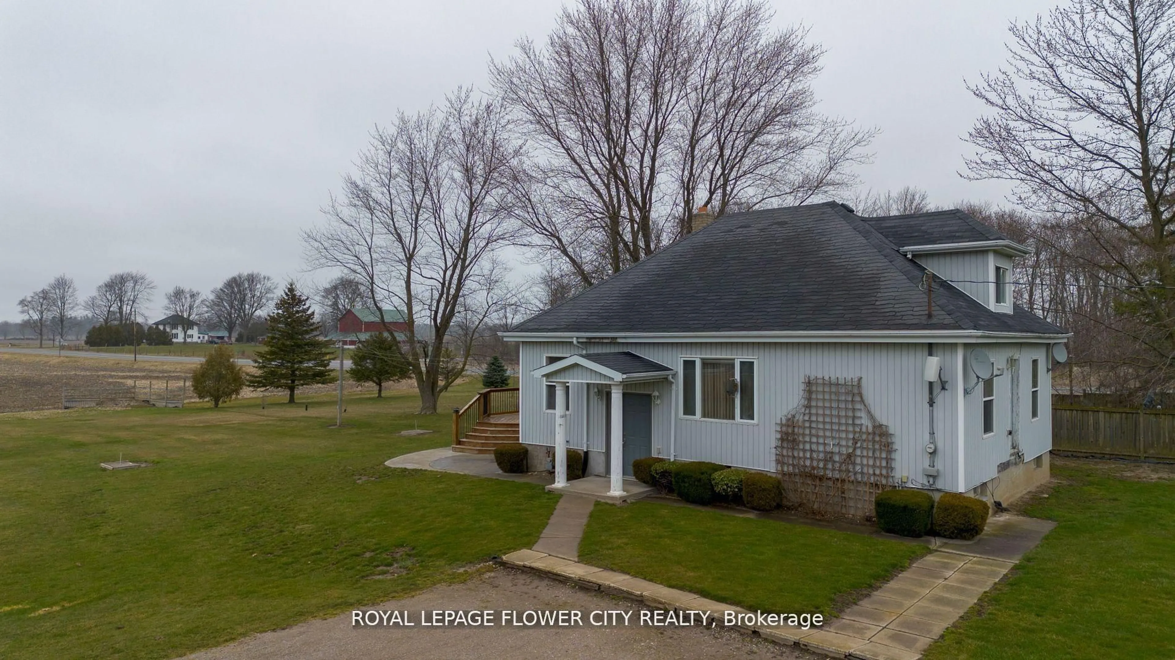 A pic from outside/outdoor area/front of a property/back of a property/a pic from drone, street for 754328 Hwy 53 Rd, Norwich Ontario N4S 7V8