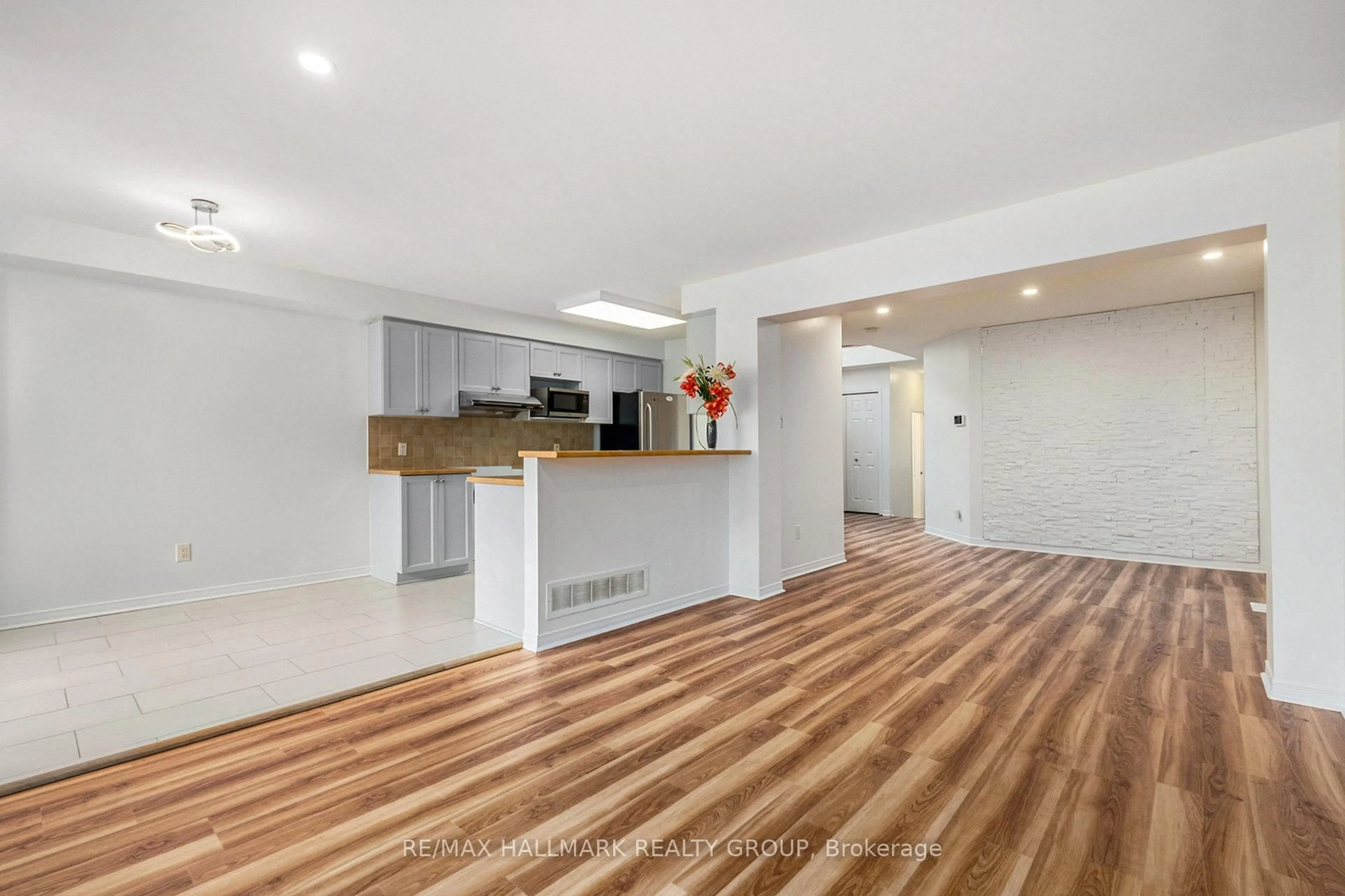Open concept kitchen, wood/laminate floor for 121 Prem Circ, Ottawa Ontario K2J 0C5
