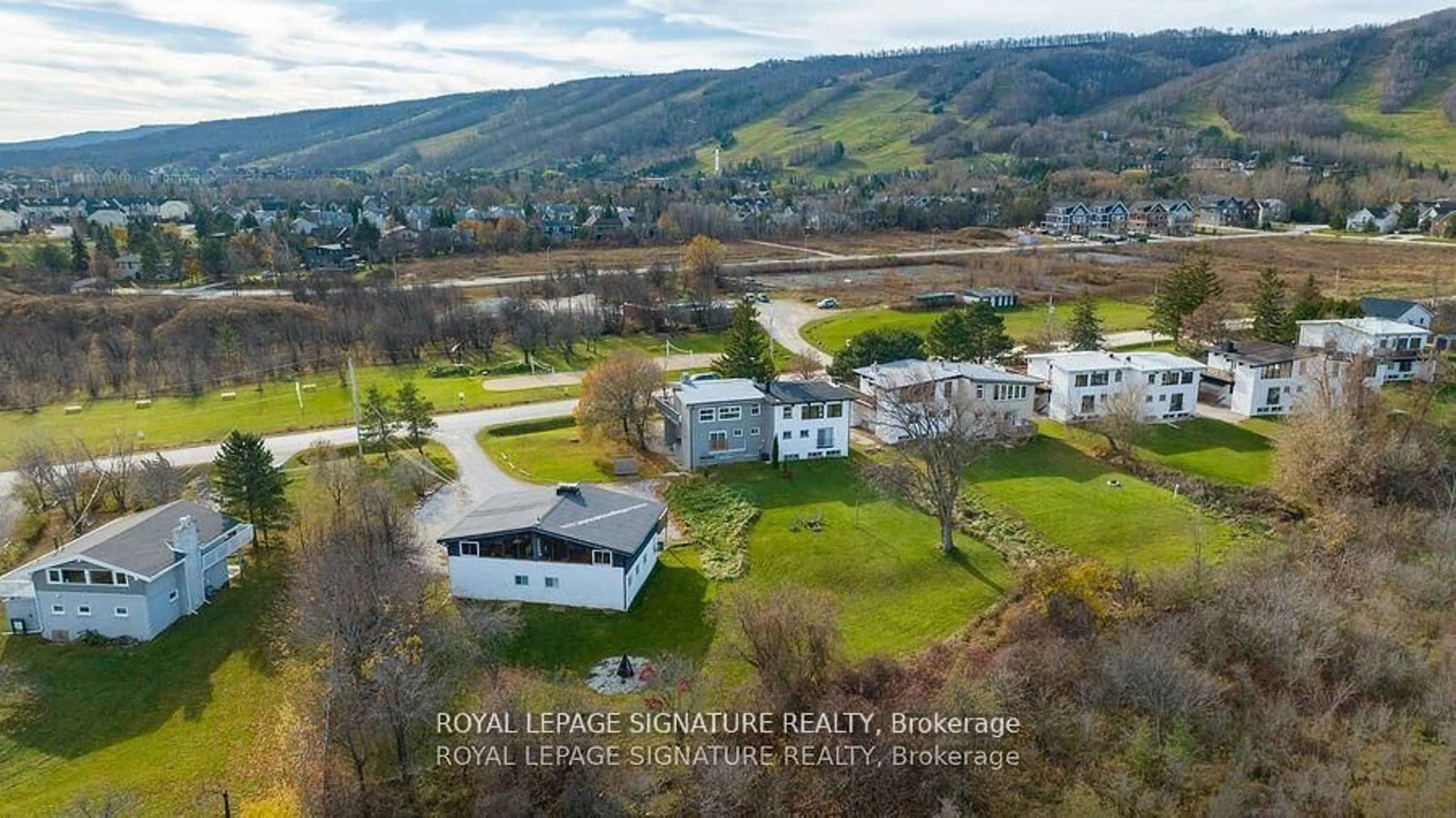 A pic from outside/outdoor area/front of a property/back of a property/a pic from drone, water/lake/river/ocean view for 163 Tyrolean Lane, Blue Mountains Ontario L9Y 3Z2