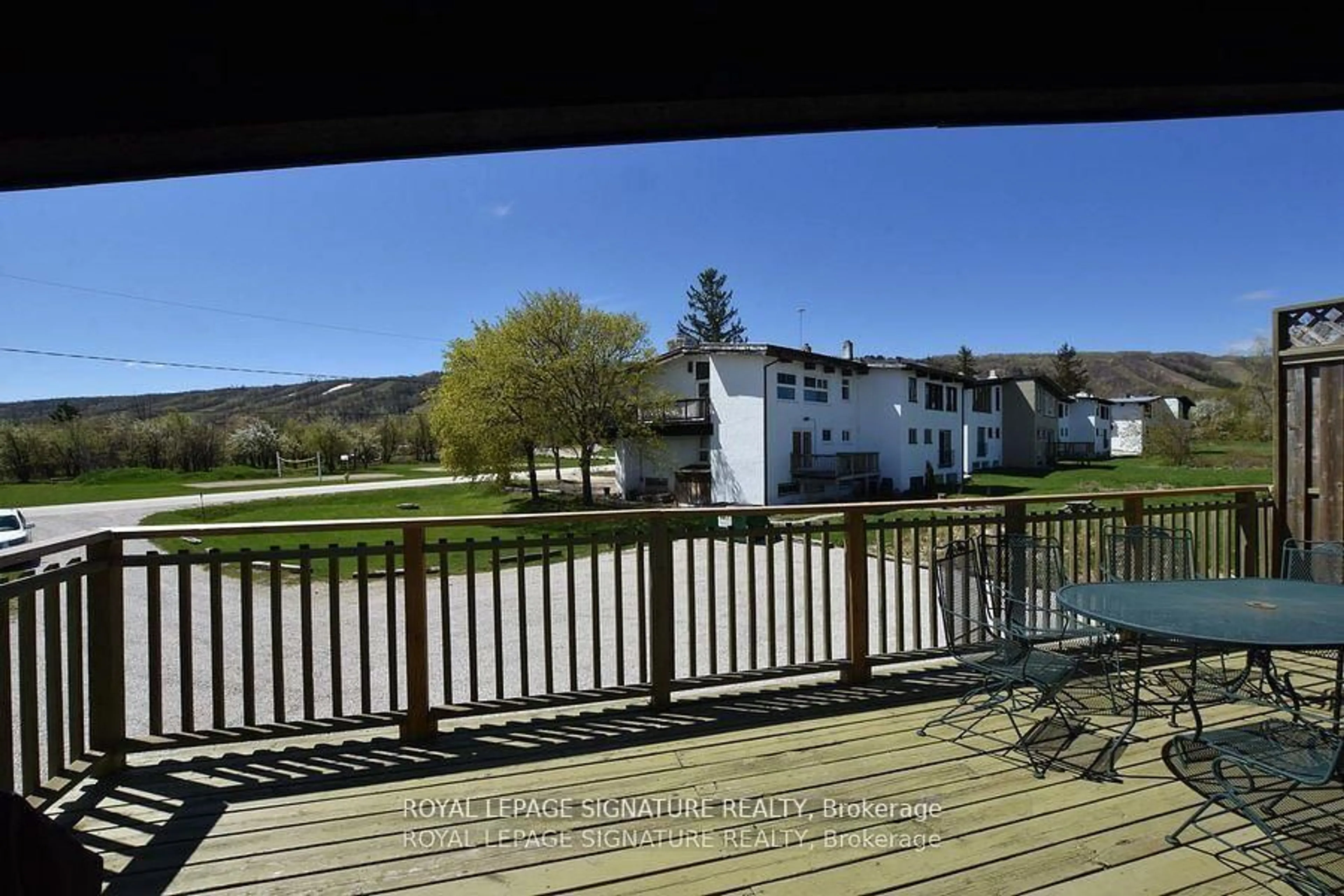 A pic from outside/outdoor area/front of a property/back of a property/a pic from drone, water/lake/river/ocean view for 163 Tyrolean Lane, Blue Mountains Ontario L9Y 3Z2
