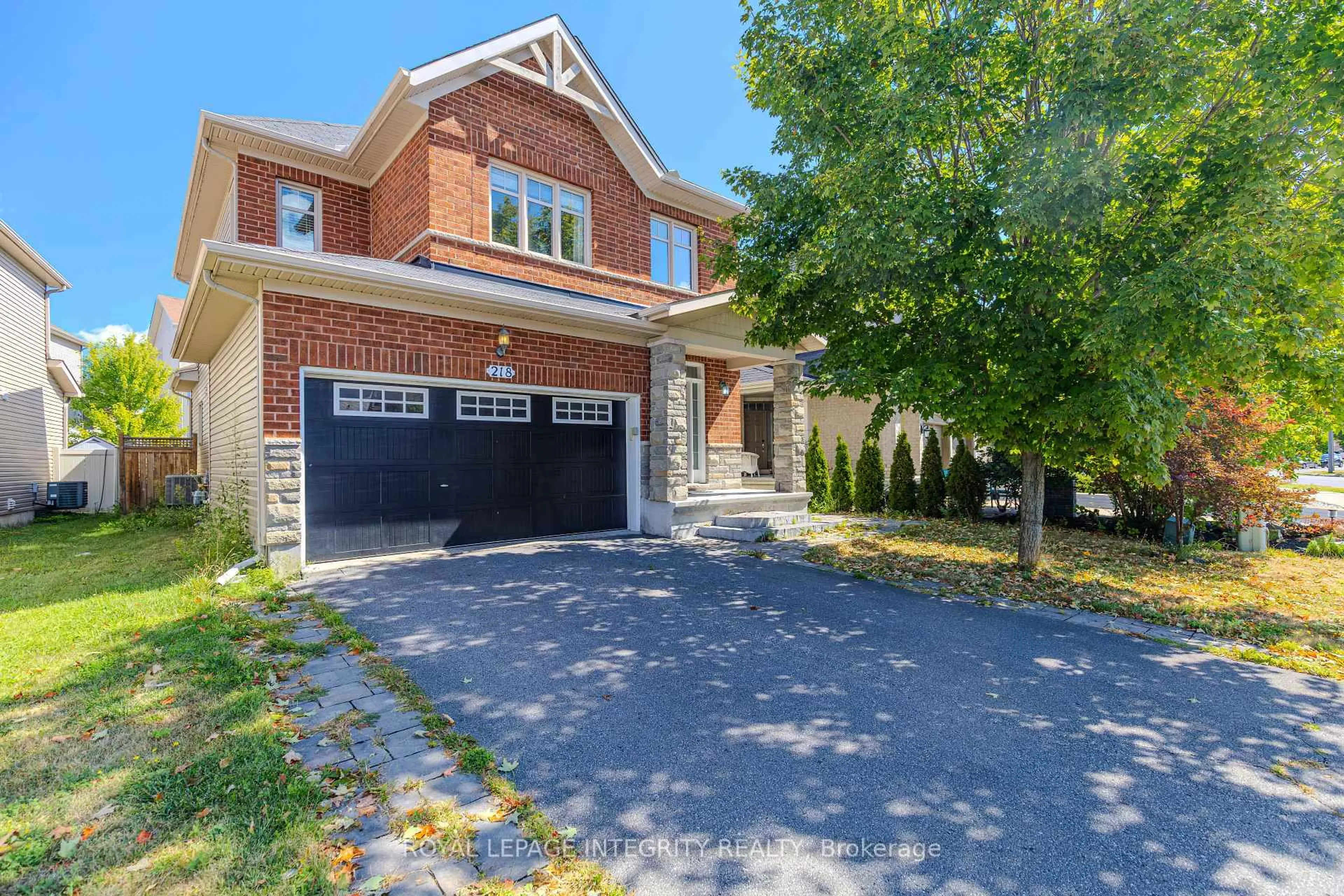 Home with brick exterior material, street for 218 Keyrock Dr, Kanata Ontario K2T 0B4
