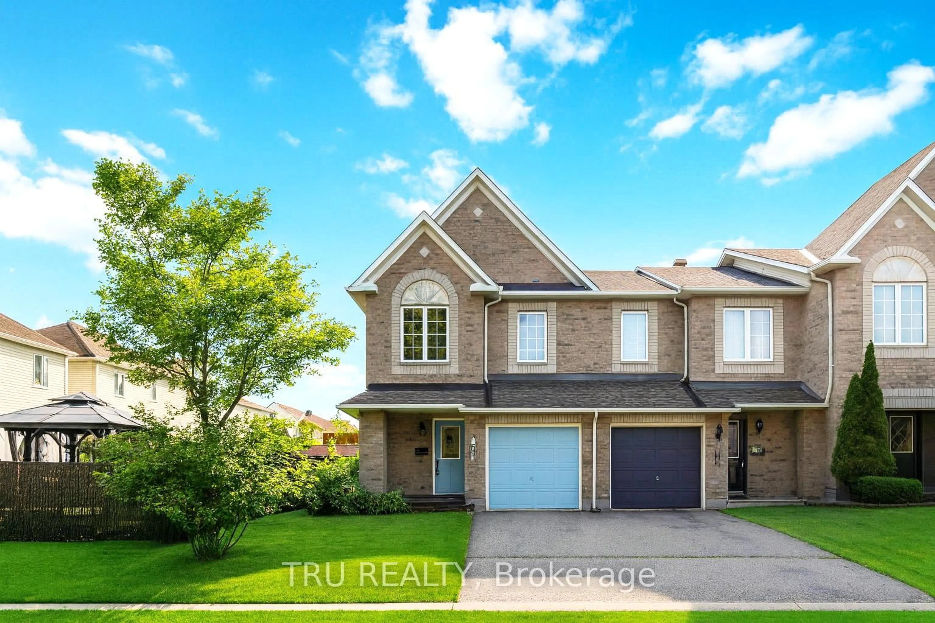 Home with brick exterior material, street for 102 Southpointe Ave, Ottawa Ontario K2J 4T5