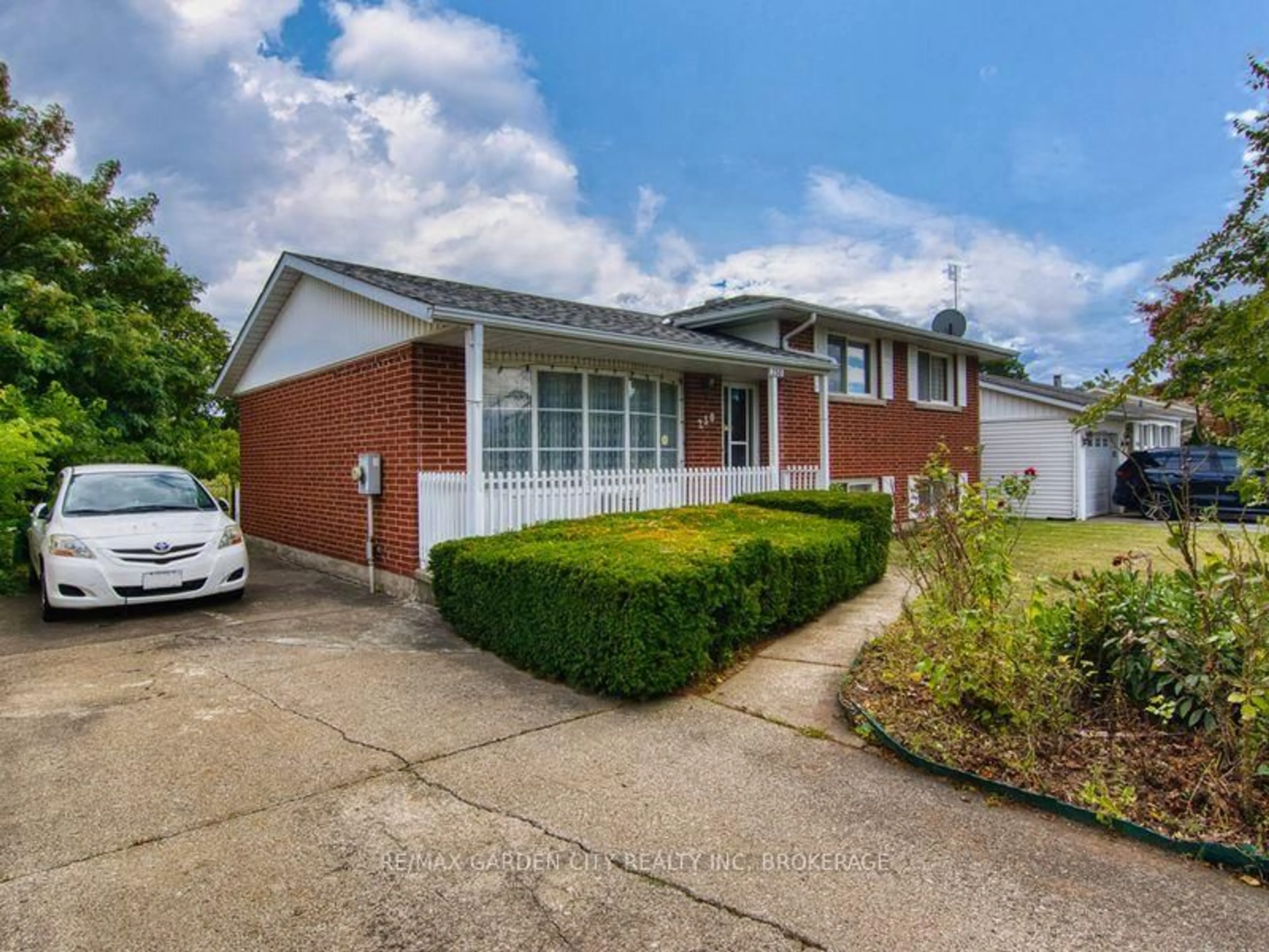 Home with brick exterior material, street for 230 Lakeshore Rd, St. Catharines Ontario L2M 1R5