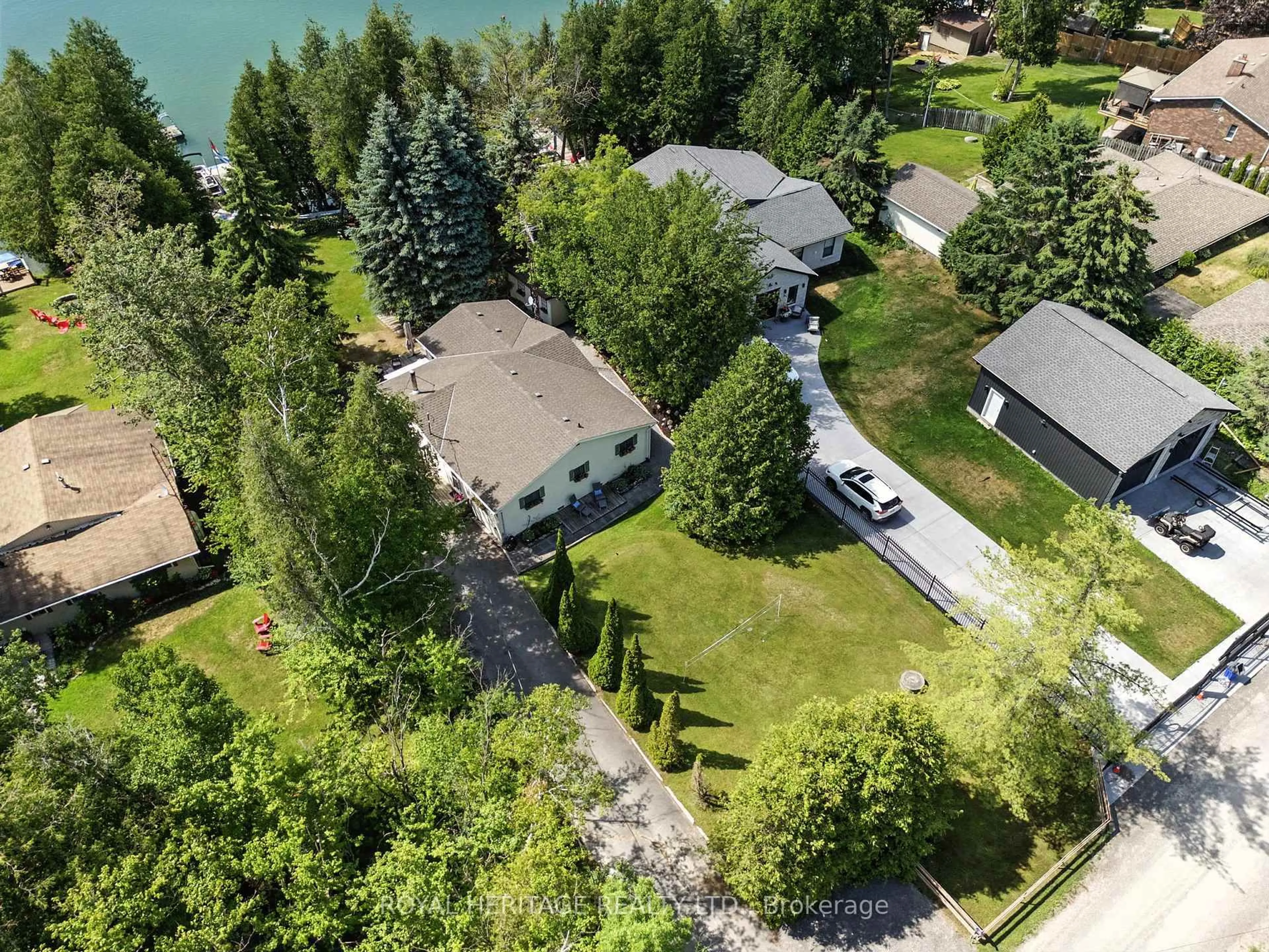 A pic from outside/outdoor area/front of a property/back of a property/a pic from drone, water/lake/river/ocean view for 42 Reddick Rd, Cramahe Ontario K0K 1S0