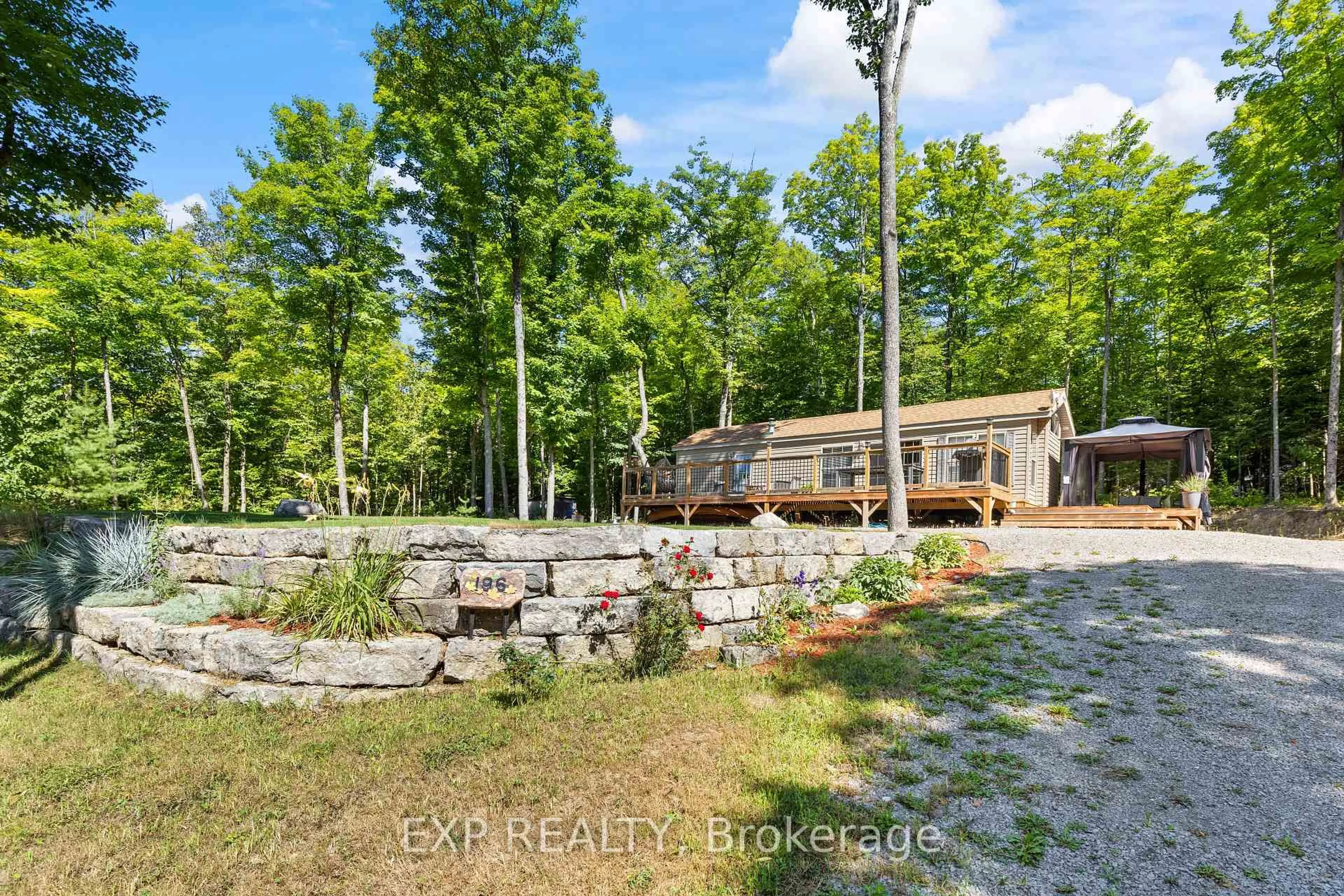 A pic from outside/outdoor area/front of a property/back of a property/a pic from drone, forest/trees view for 196 Maple Grove Lane, Eganville Ontario K0J 1T0