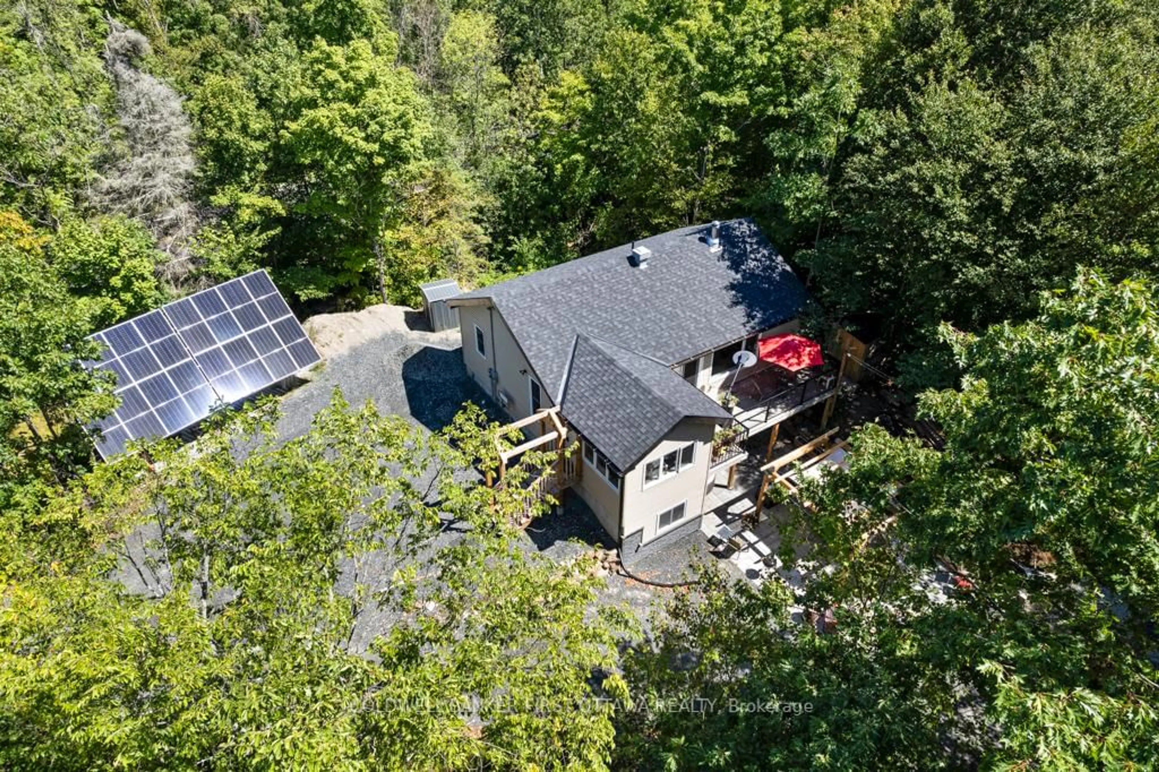 A pic from outside/outdoor area/front of a property/back of a property/a pic from drone, forest/trees view for 4031 Bolingbroke Rd, Maberly Ontario K0H 2B0