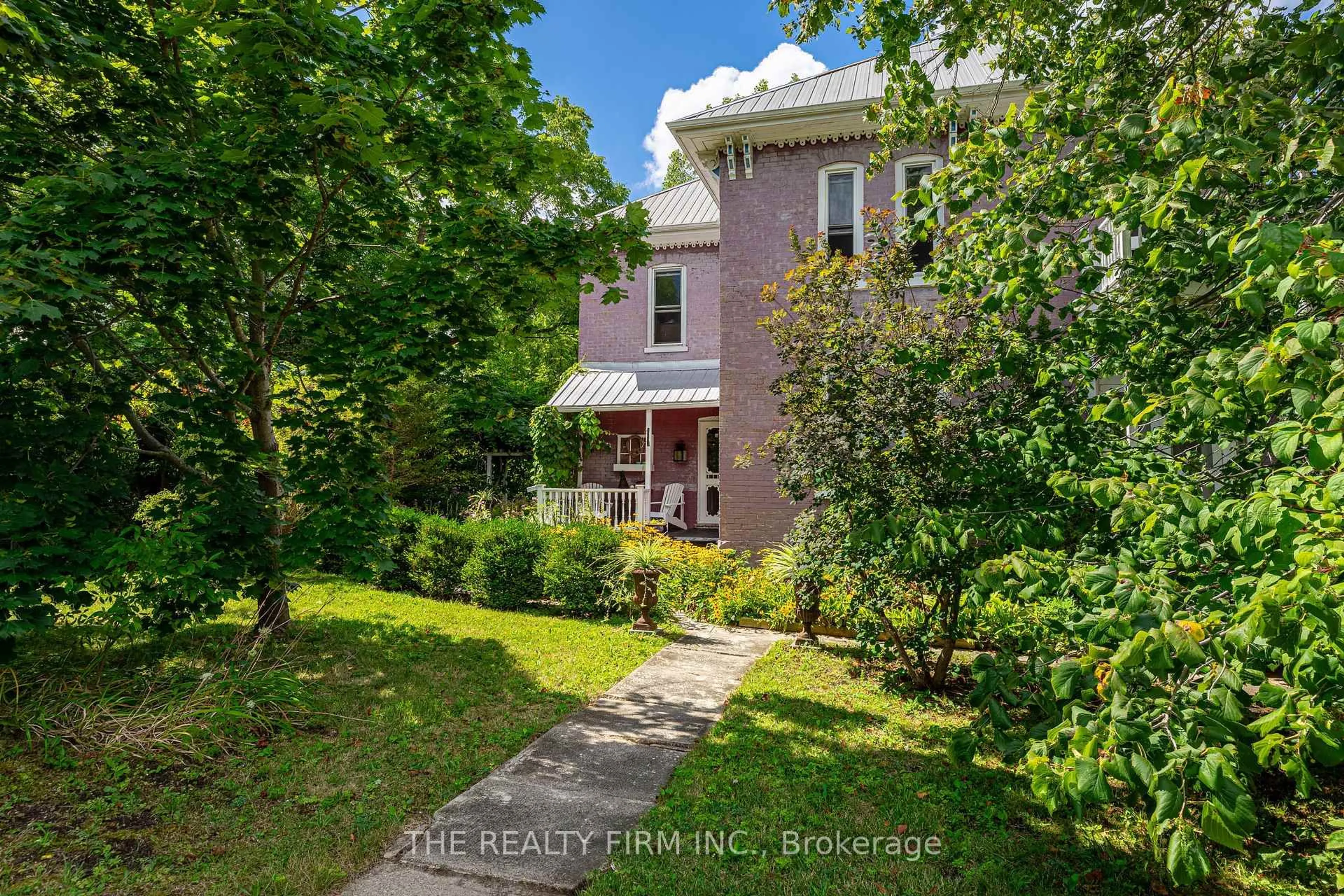 A pic from outside/outdoor area/front of a property/back of a property/a pic from drone, street for 9785 John St, Southwold Ontario N0L 2E0