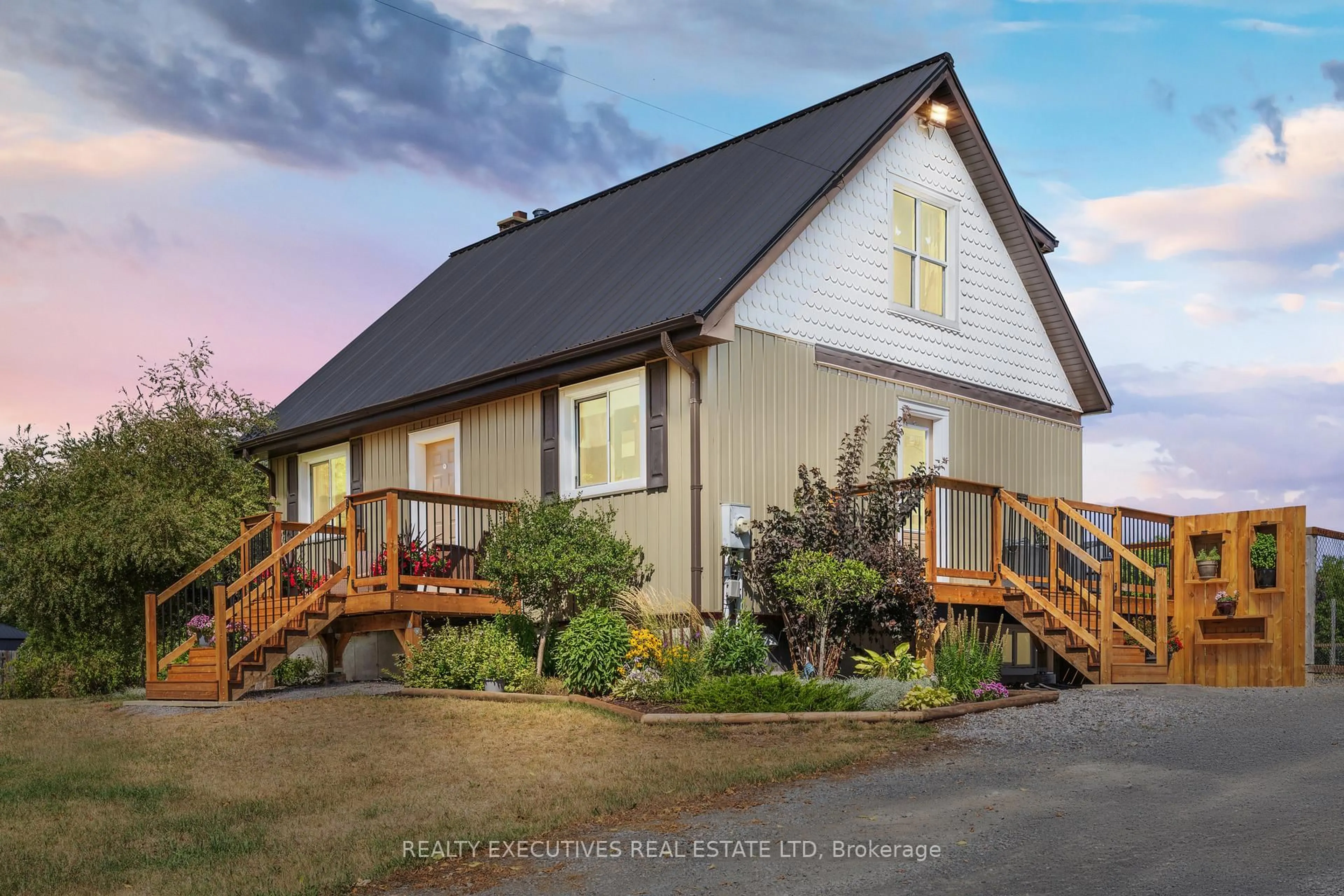 Home with vinyl exterior material, street for 12705 Maple Ridge Rd, North Dundas Ontario K0C 2K0
