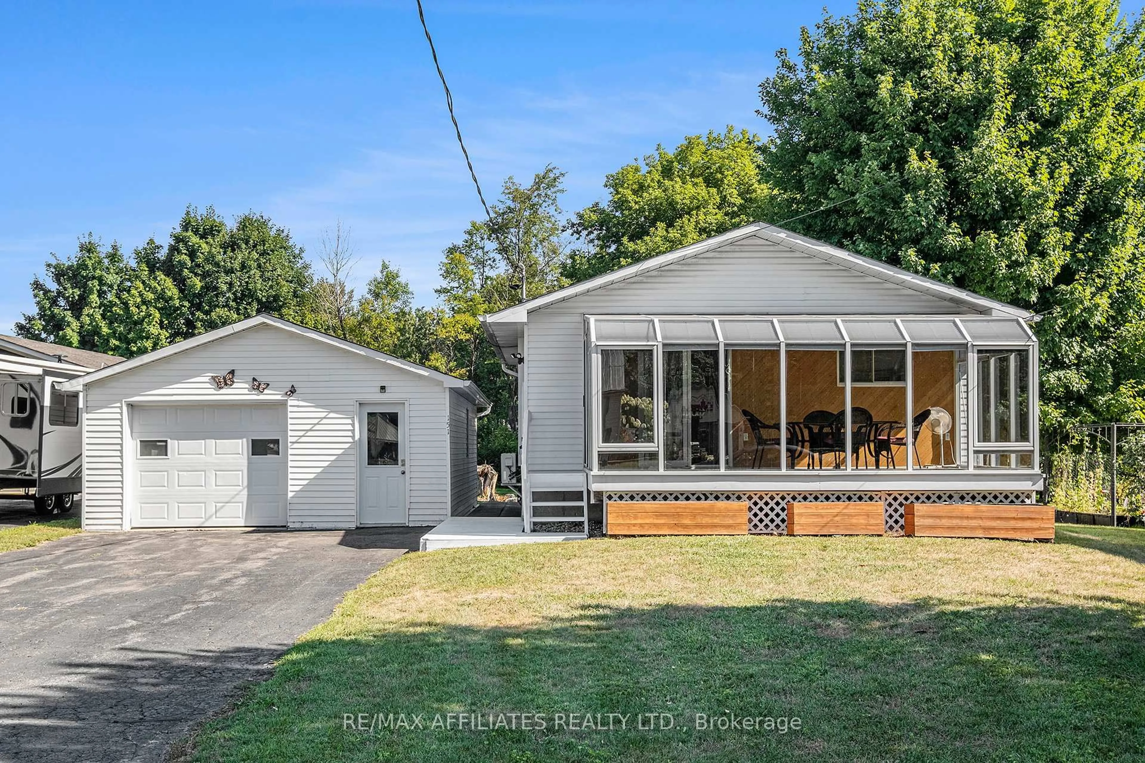 Home with vinyl exterior material, street for 151 Ottawa St, The Nation Ontario K0A 2M0