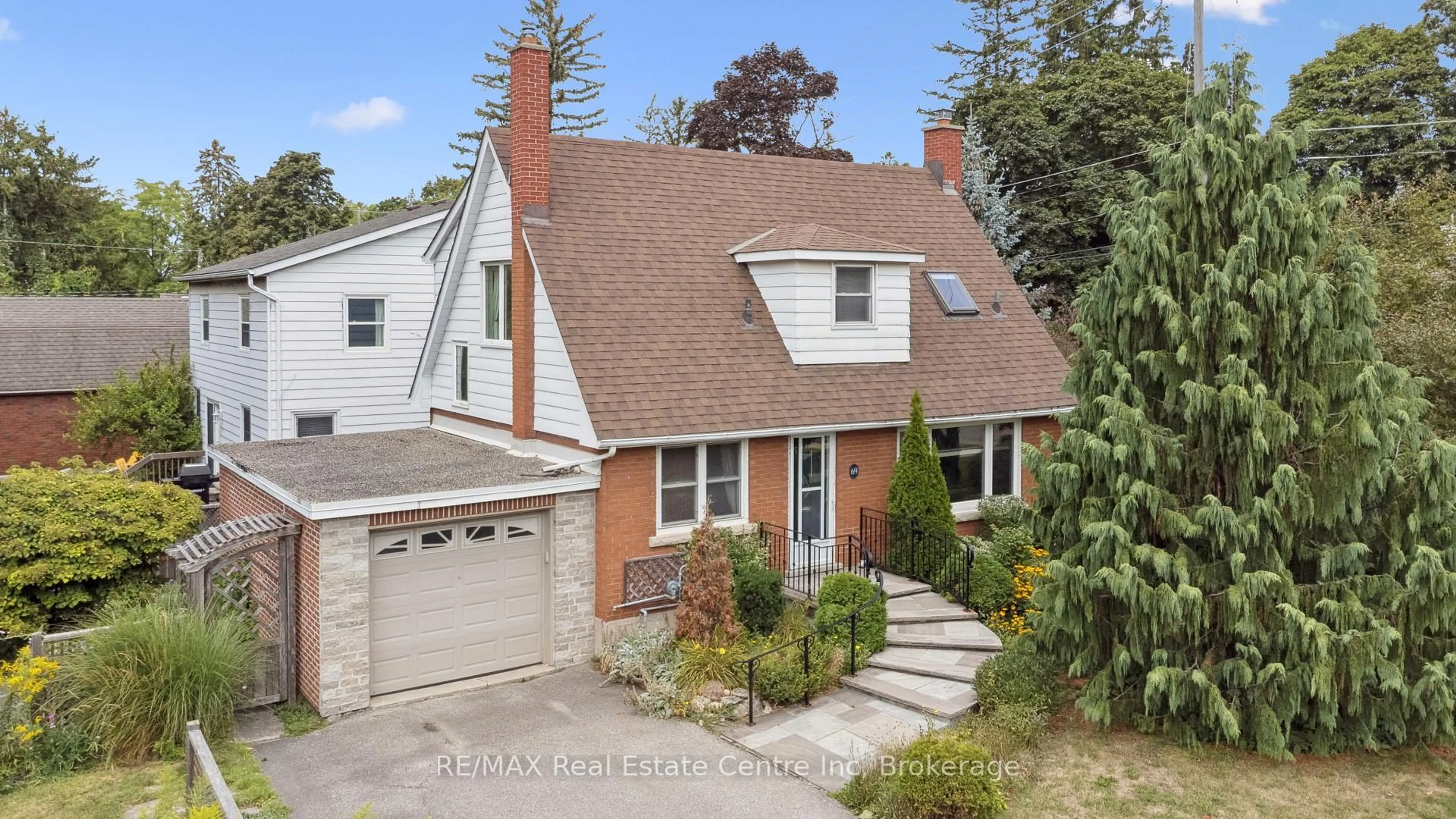 Home with brick exterior material, street for 69 Forest St, Guelph Ontario N1G 1J3