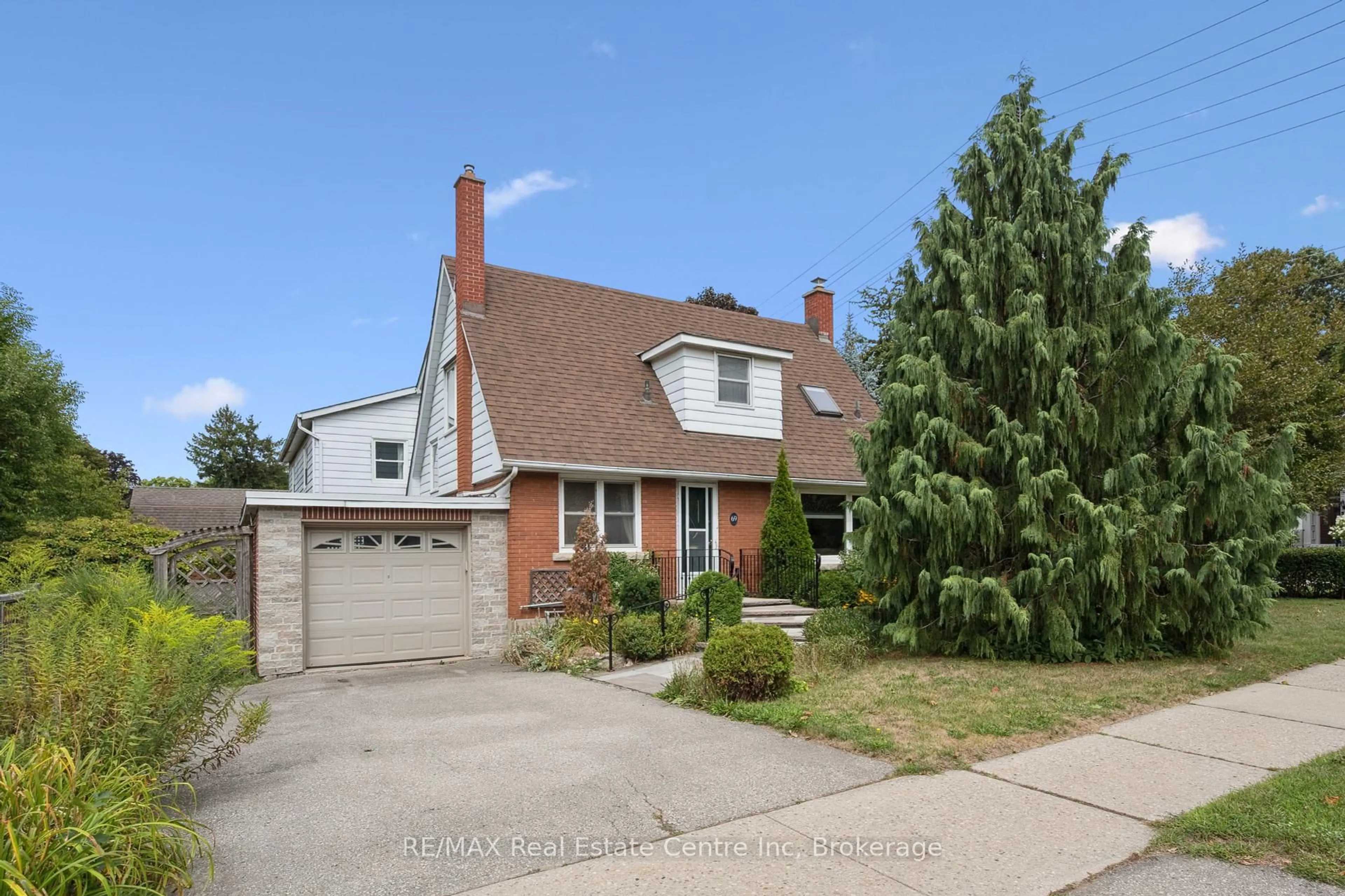 Home with brick exterior material, street for 69 Forest St, Guelph Ontario N1G 1J3