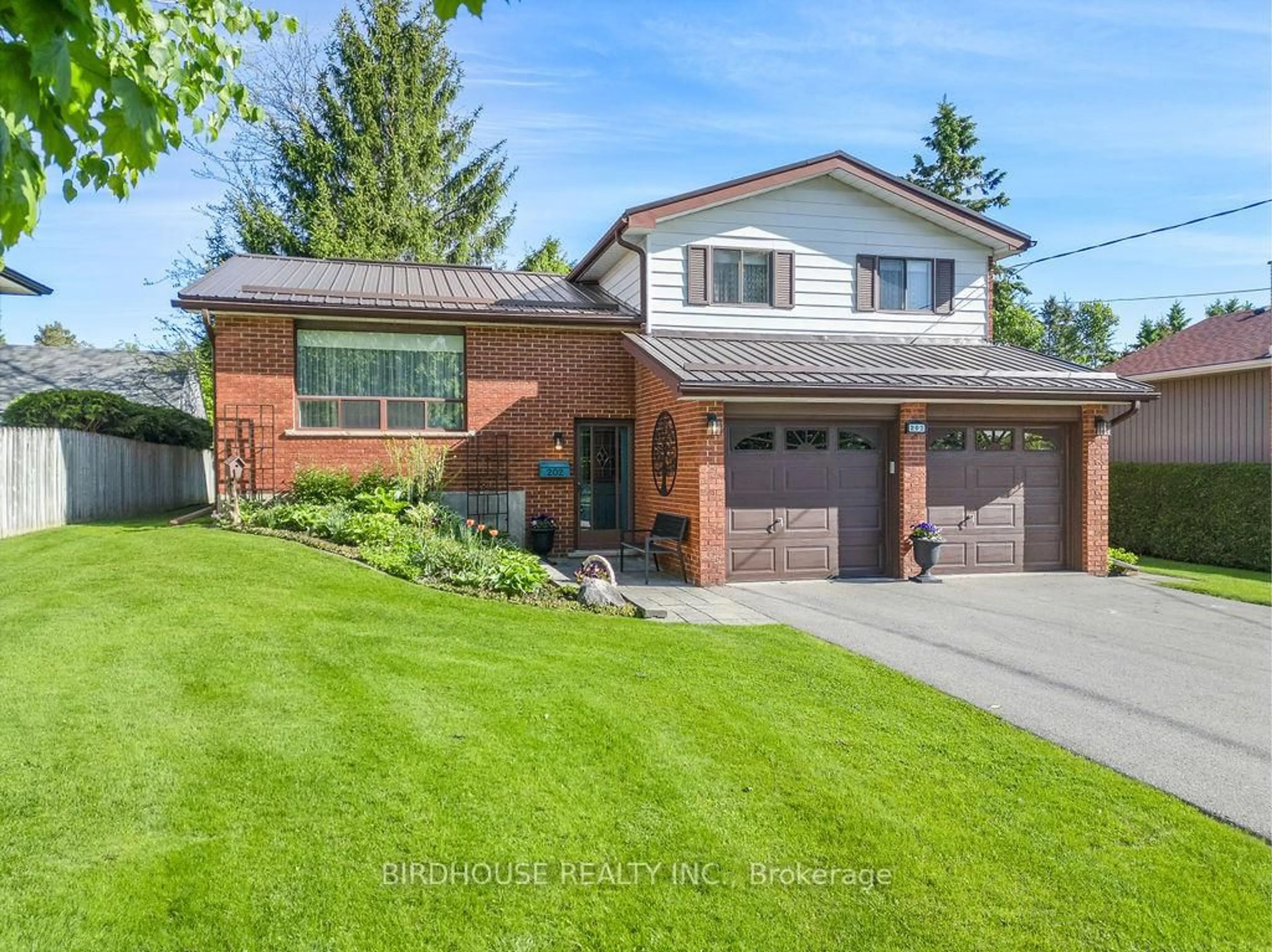 Home with brick exterior material, street for 202 Mary St, Kawartha Lakes Ontario K9V 2N8