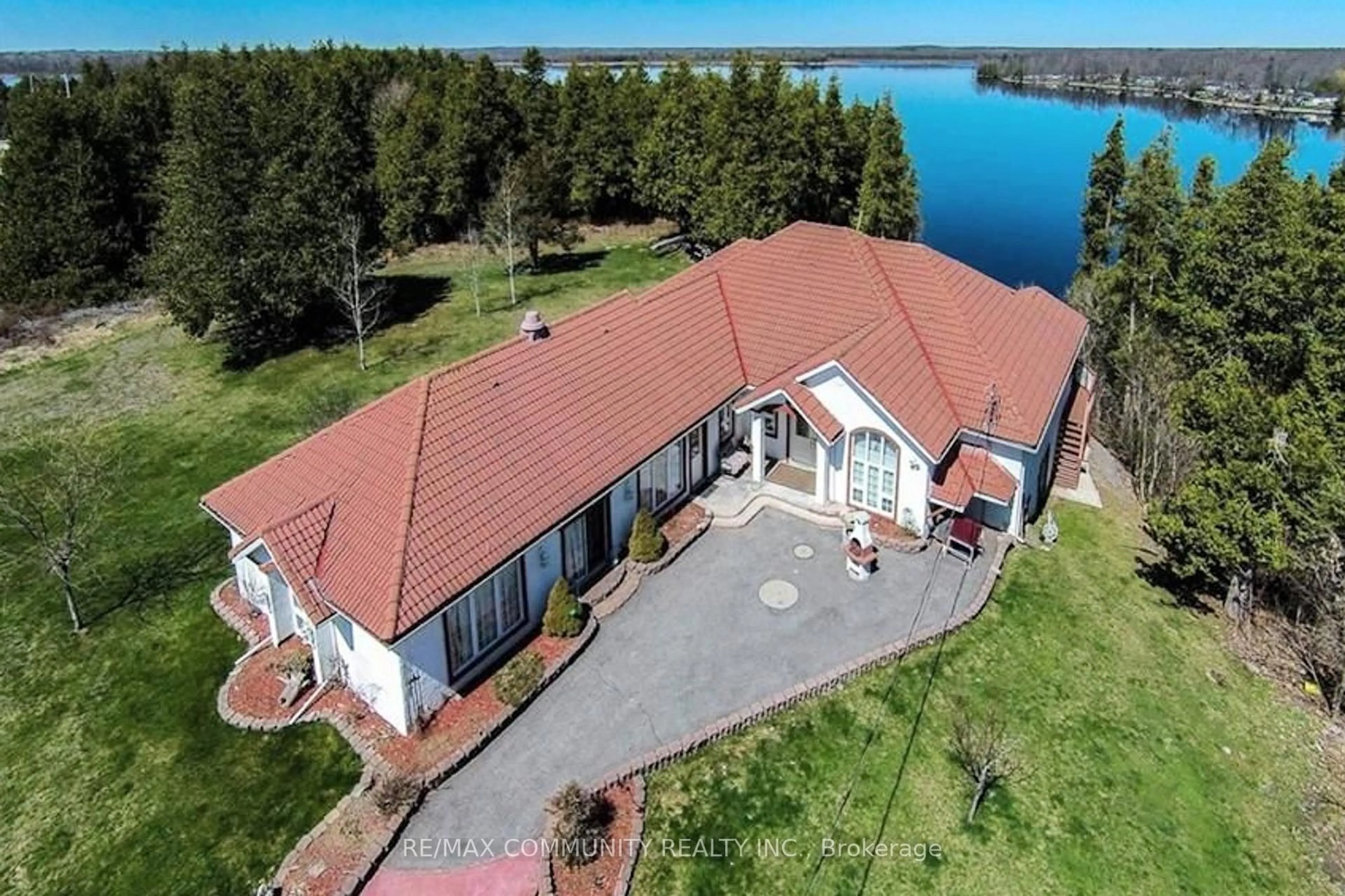 A pic from outside/outdoor area/front of a property/back of a property/a pic from drone, water/lake/river/ocean view for 74 Lakeview Dr, Trent Hills Ontario K0L 2L0