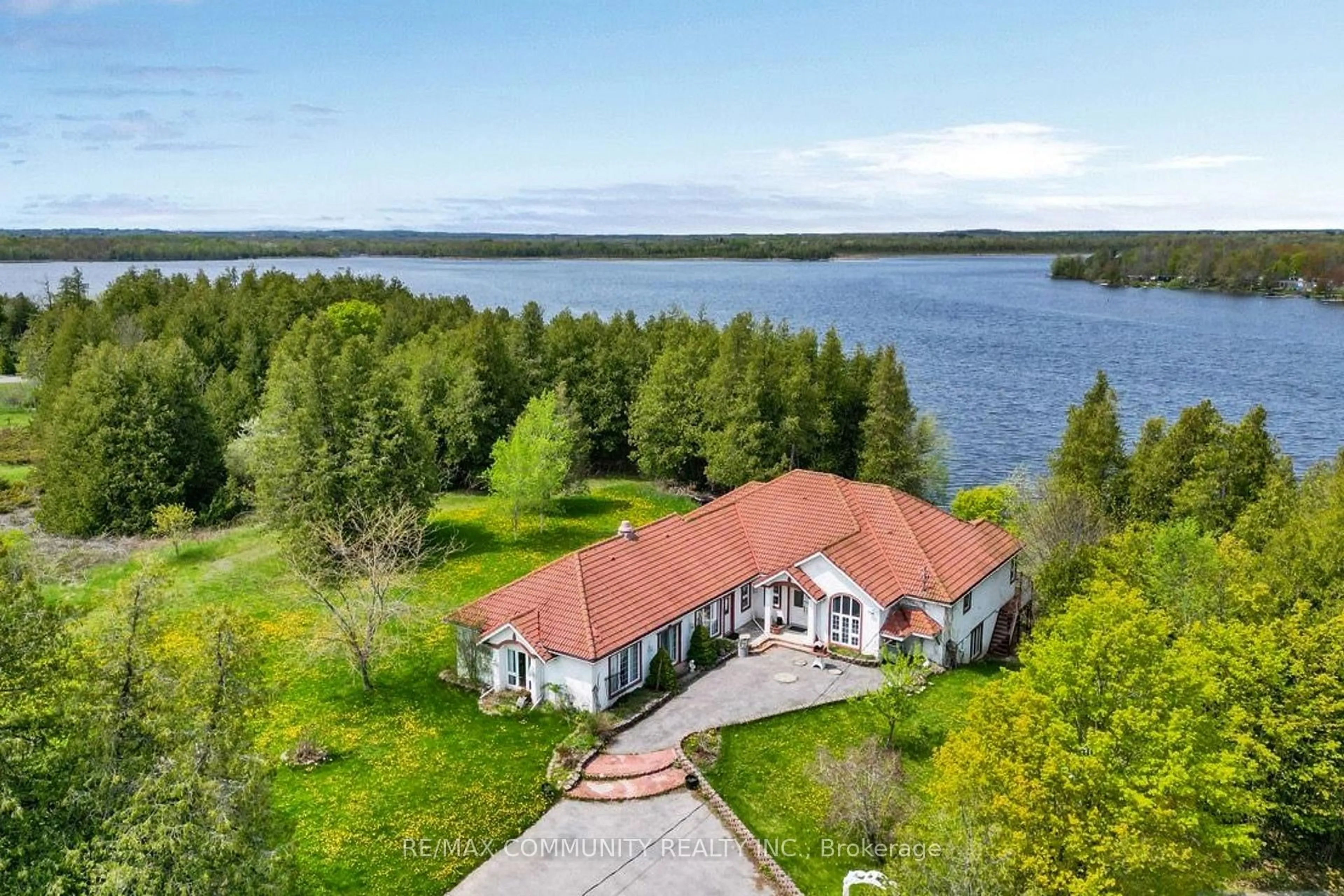 A pic from outside/outdoor area/front of a property/back of a property/a pic from drone, water/lake/river/ocean view for 74 Lakeview Dr, Trent Hills Ontario K0L 2L0