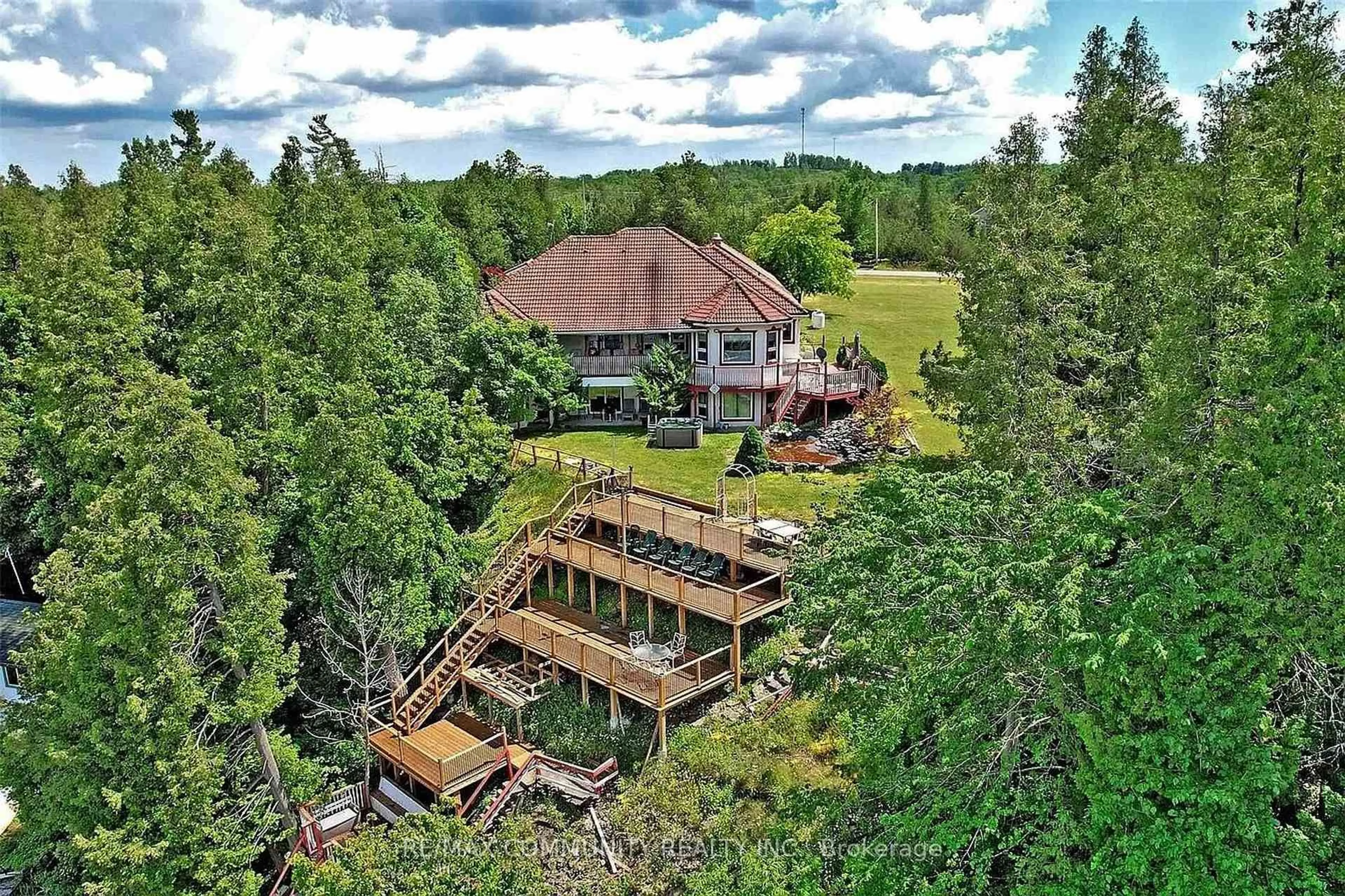 A pic from outside/outdoor area/front of a property/back of a property/a pic from drone, forest/trees view for 74 Lakeview Dr, Trent Hills Ontario K0L 2L0