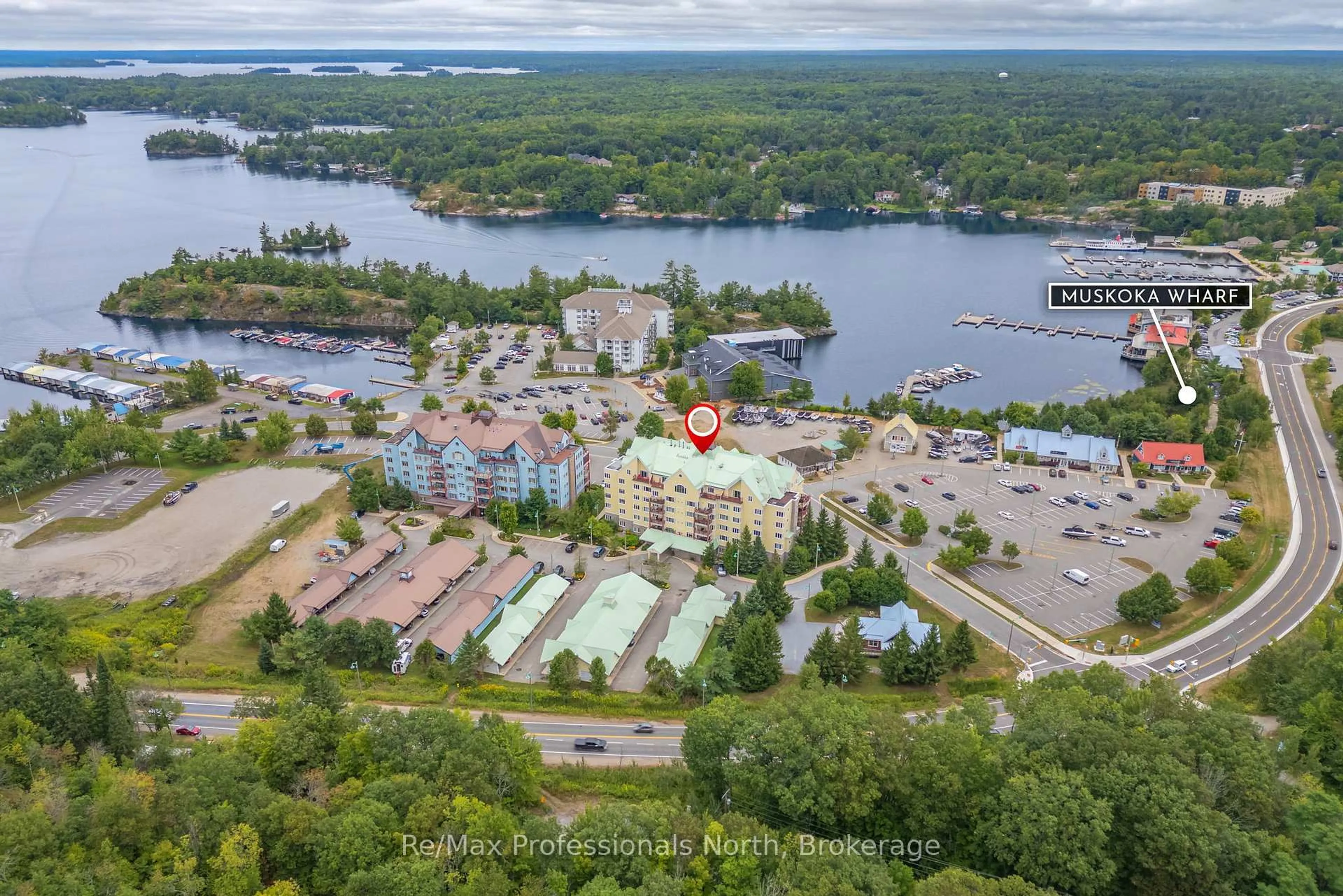 A pic from outside/outdoor area/front of a property/back of a property/a pic from drone, water/lake/river/ocean view for 110 Steamship Bay Rd #207, Gravenhurst Ontario P1P 1Z9