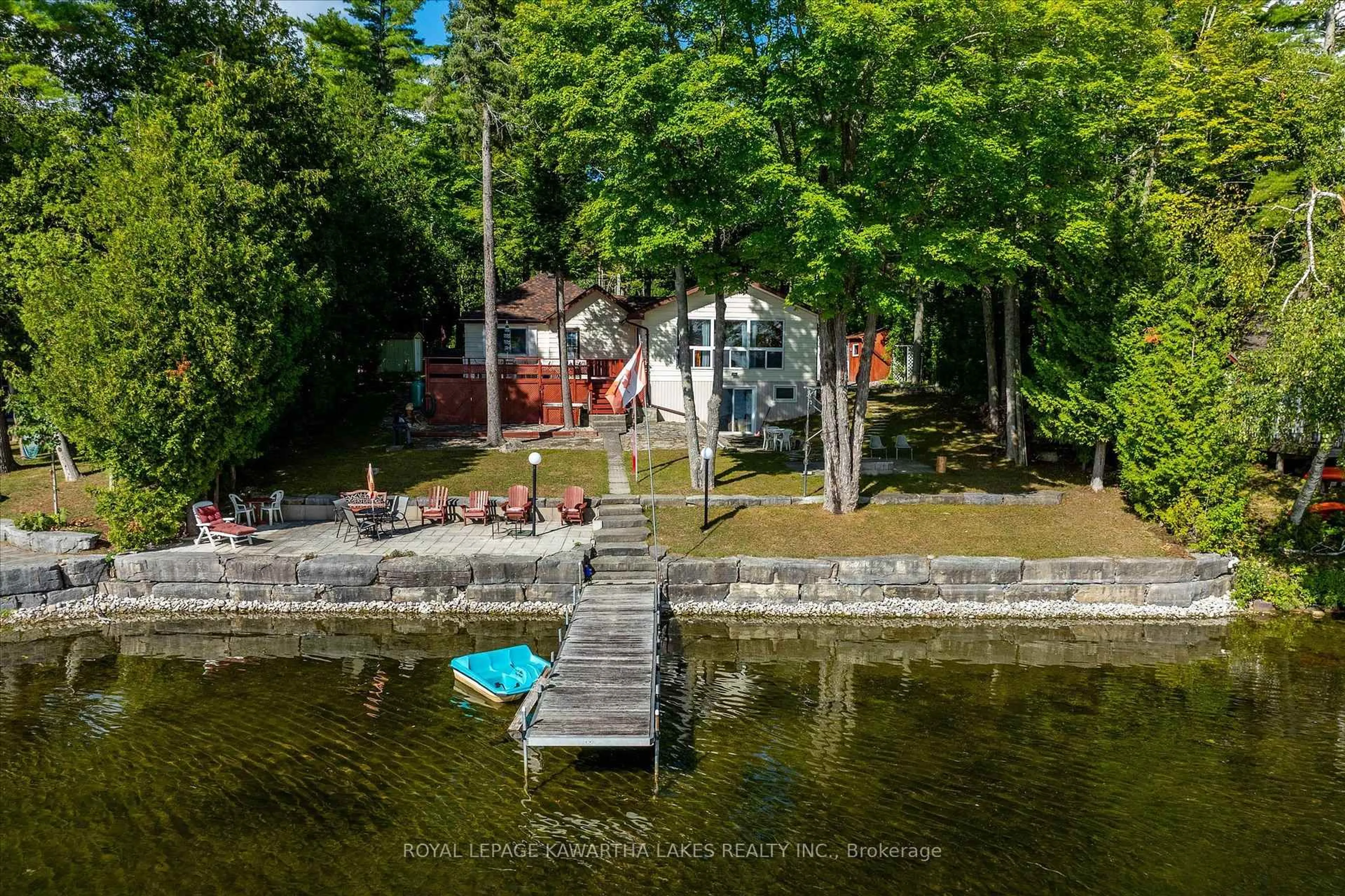 A pic from outside/outdoor area/front of a property/back of a property/a pic from drone, water/lake/river/ocean view for 1999 White Lake Rd W Rd, Douro-Dummer Ontario K0L 2H0