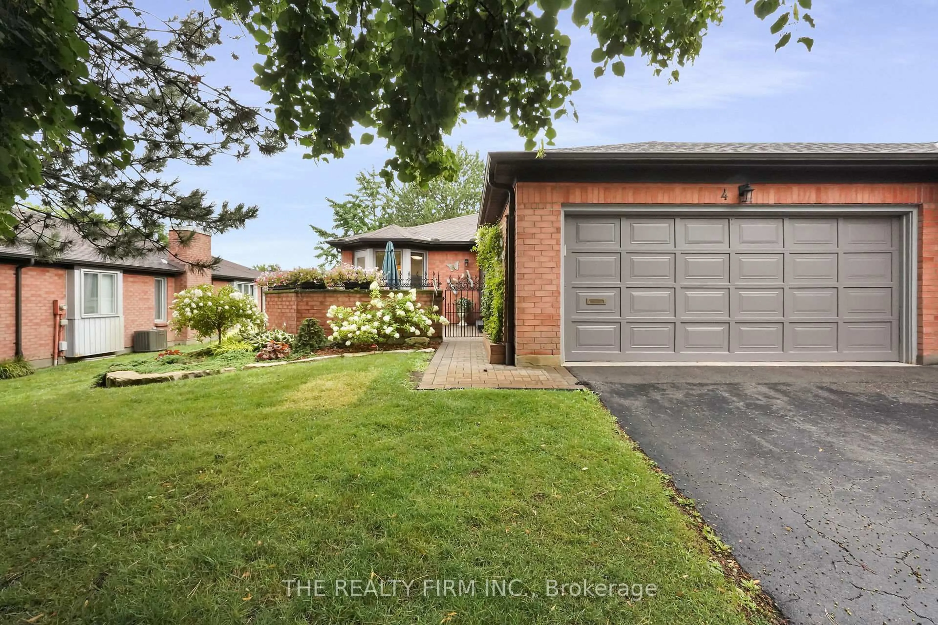Home with brick exterior material, street for 65 Fiddlers Green Rd #4, London North Ontario N6H 4V5