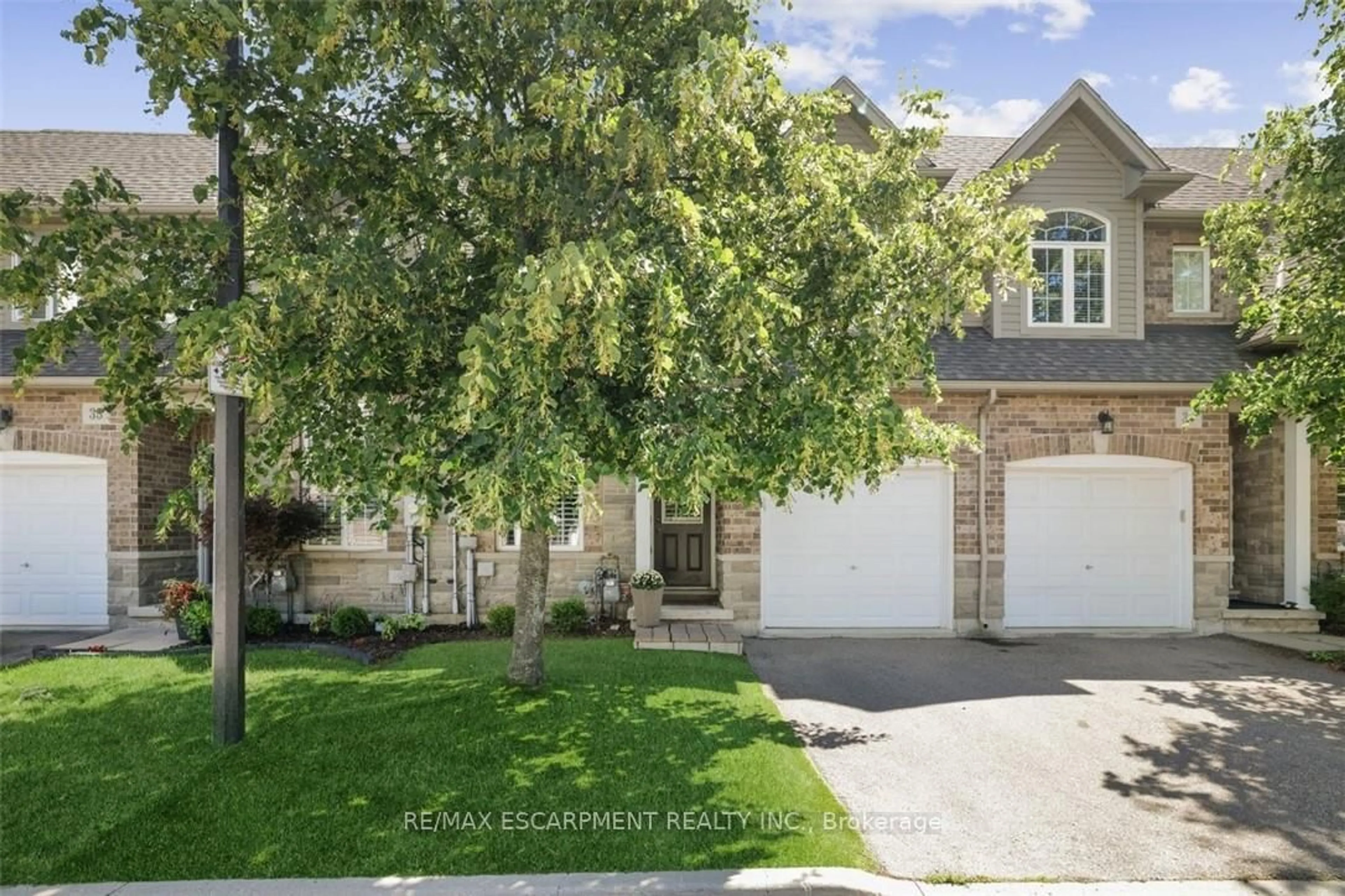 A pic from outside/outdoor area/front of a property/back of a property/a pic from drone, street for 6 Atessa Dr #36, Hamilton Ontario L9B 0C6