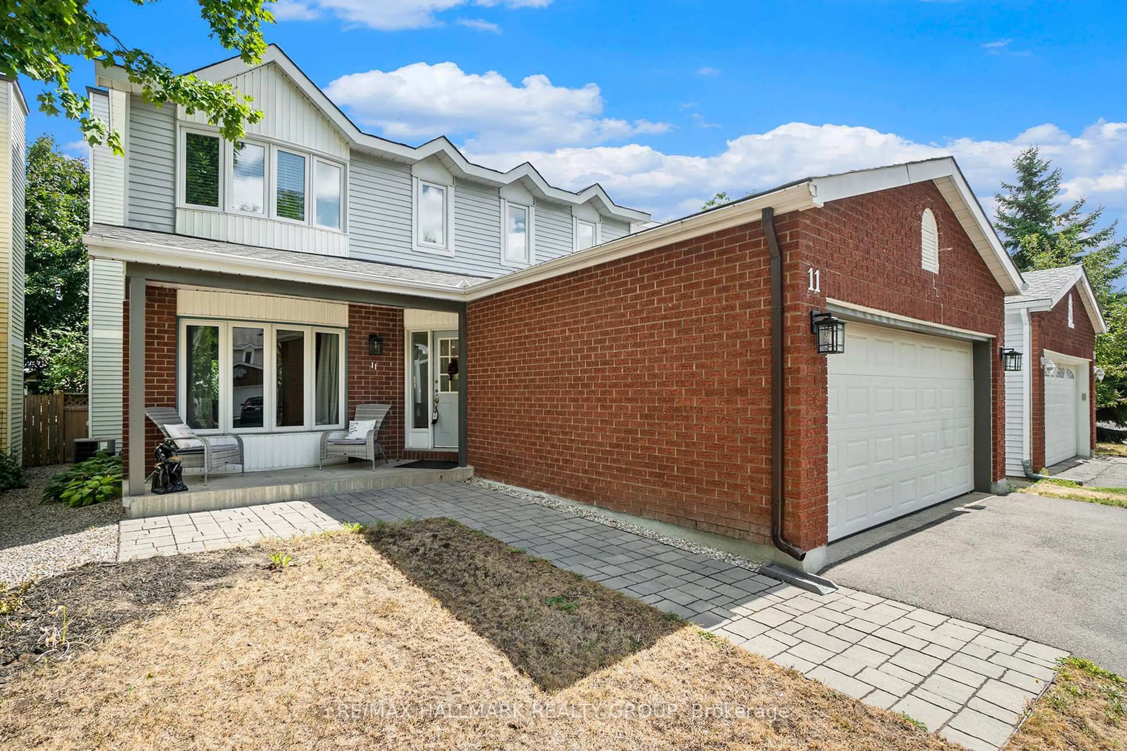 Home with brick exterior material, street for 11 Ellisson Way, Ottawa Ontario K1G 4N9