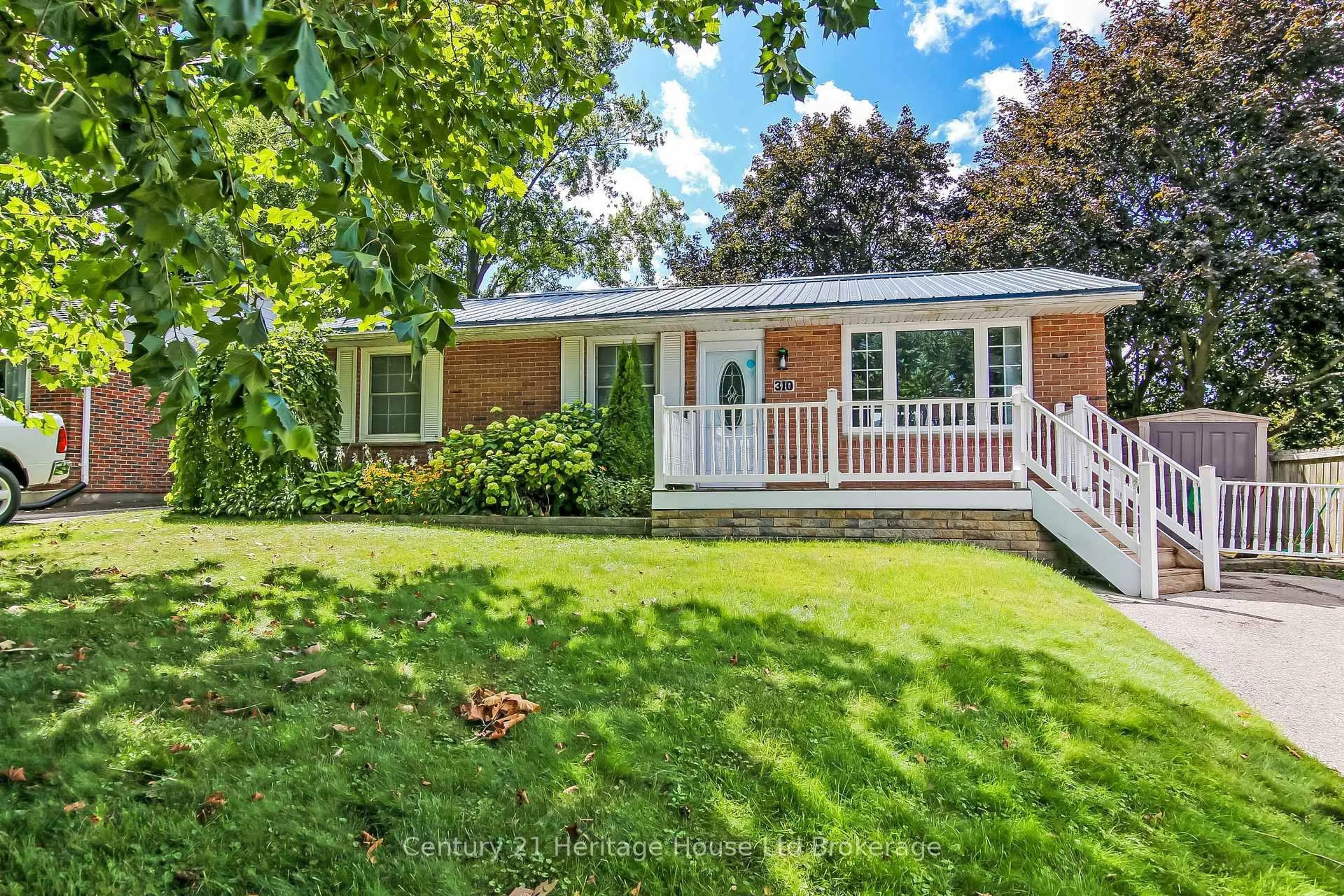 Home with vinyl exterior material, street for 310 Short Ave, Woodstock Ontario N4S 4B1
