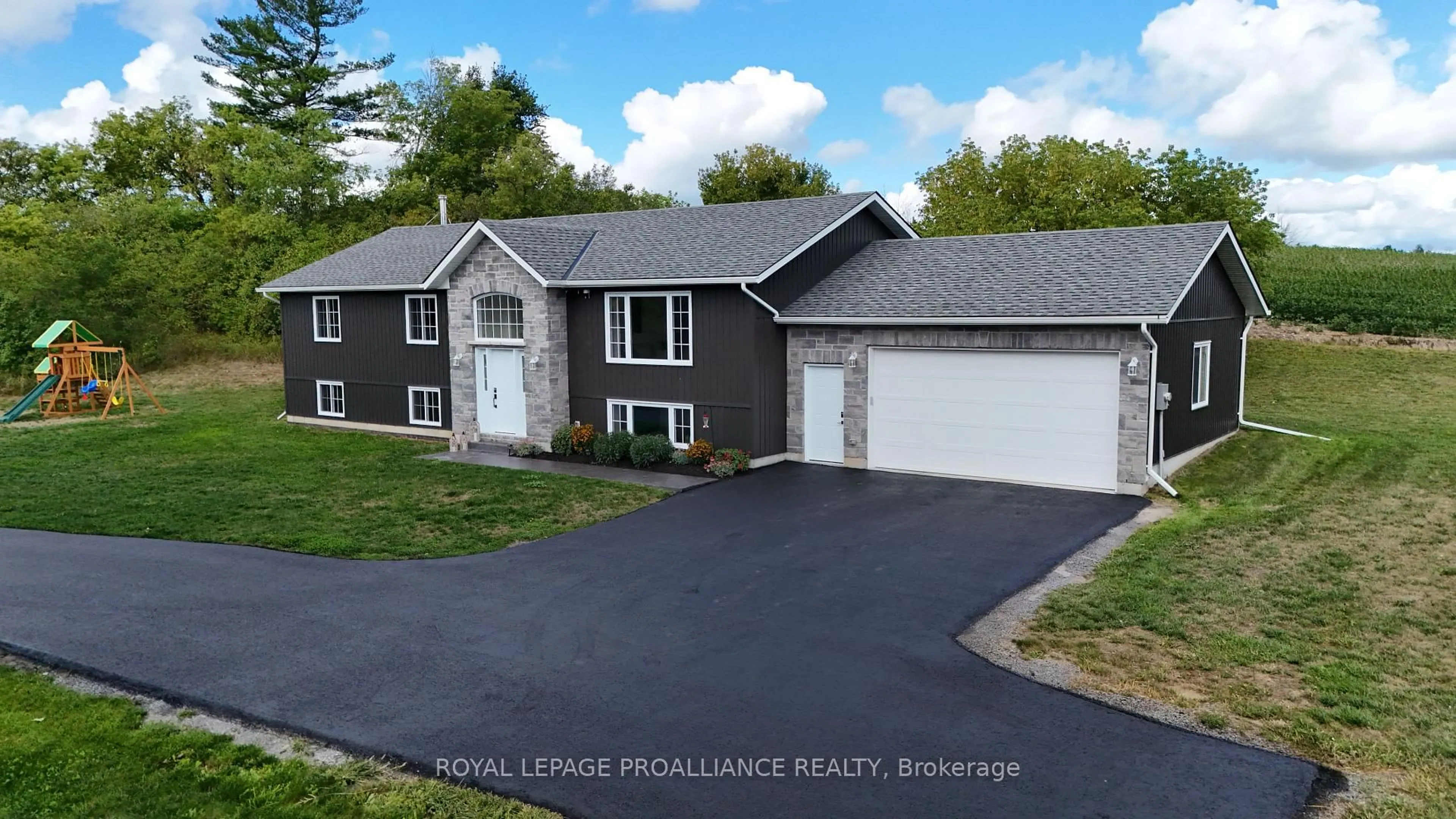 Home with vinyl exterior material, street for 426 Free Rd, Hastings Ontario K0K 2C0