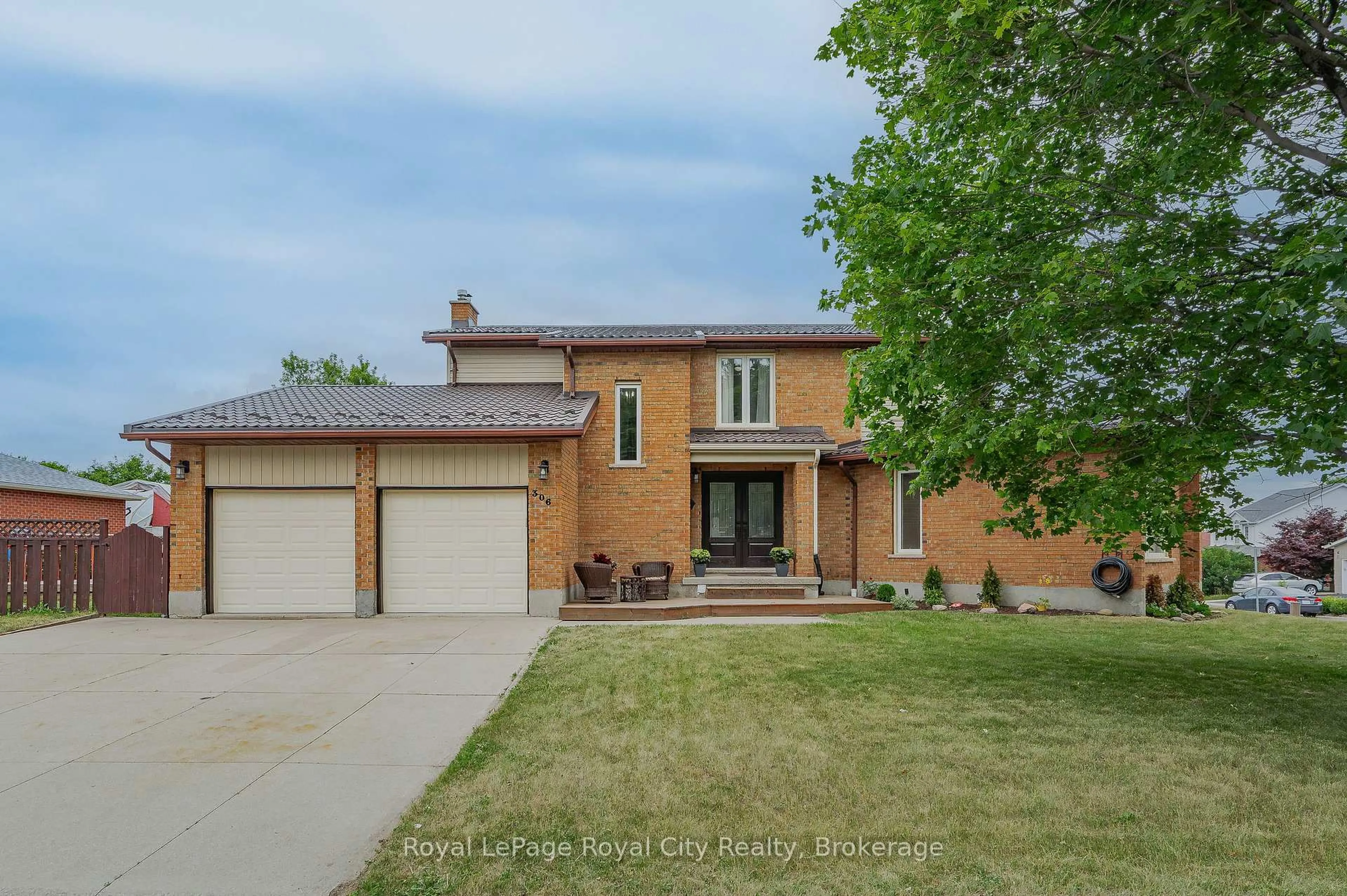 Home with brick exterior material, street for 306 Imperial Rd, Guelph Ontario N1K 1M4