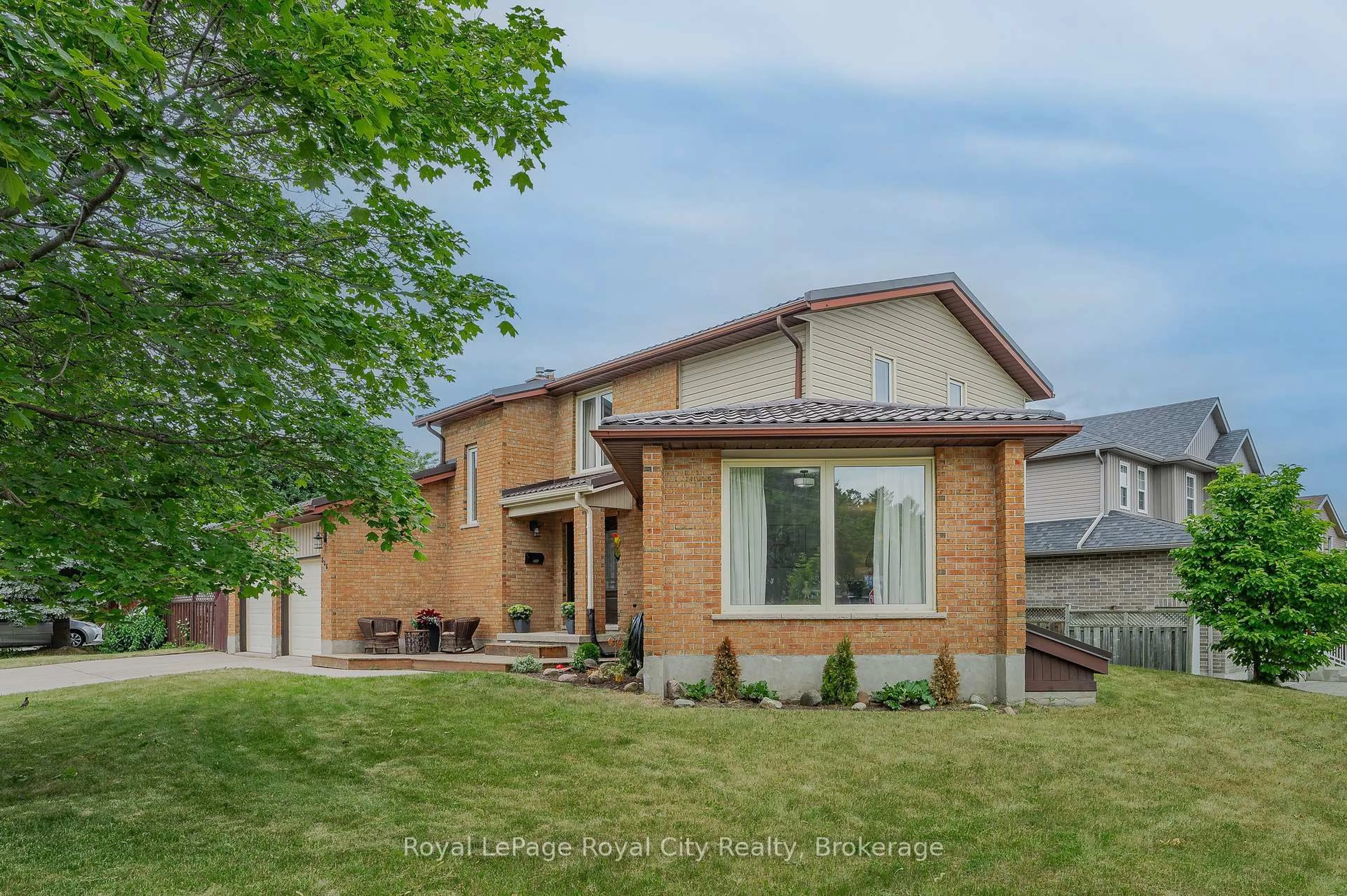 Home with brick exterior material, street for 306 Imperial Rd, Guelph Ontario N1K 1M4