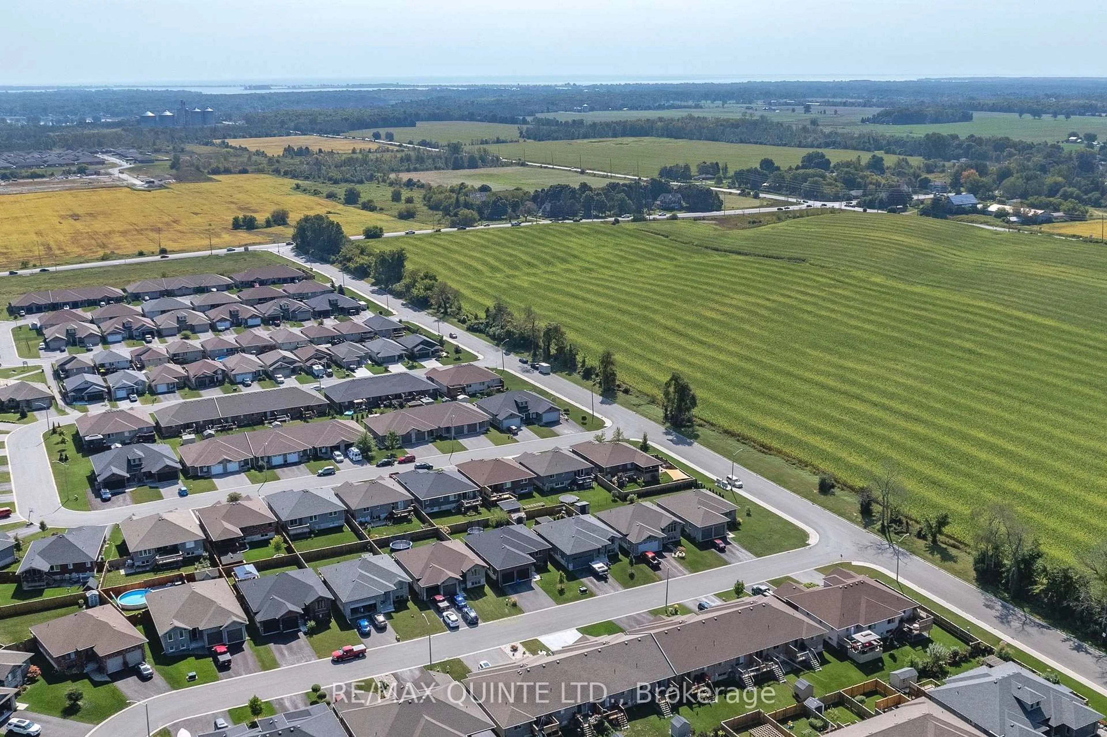 A pic from outside/outdoor area/front of a property/back of a property/a pic from drone, street for 56 McIntosh Cres, Quinte West Ontario K8V 0G1