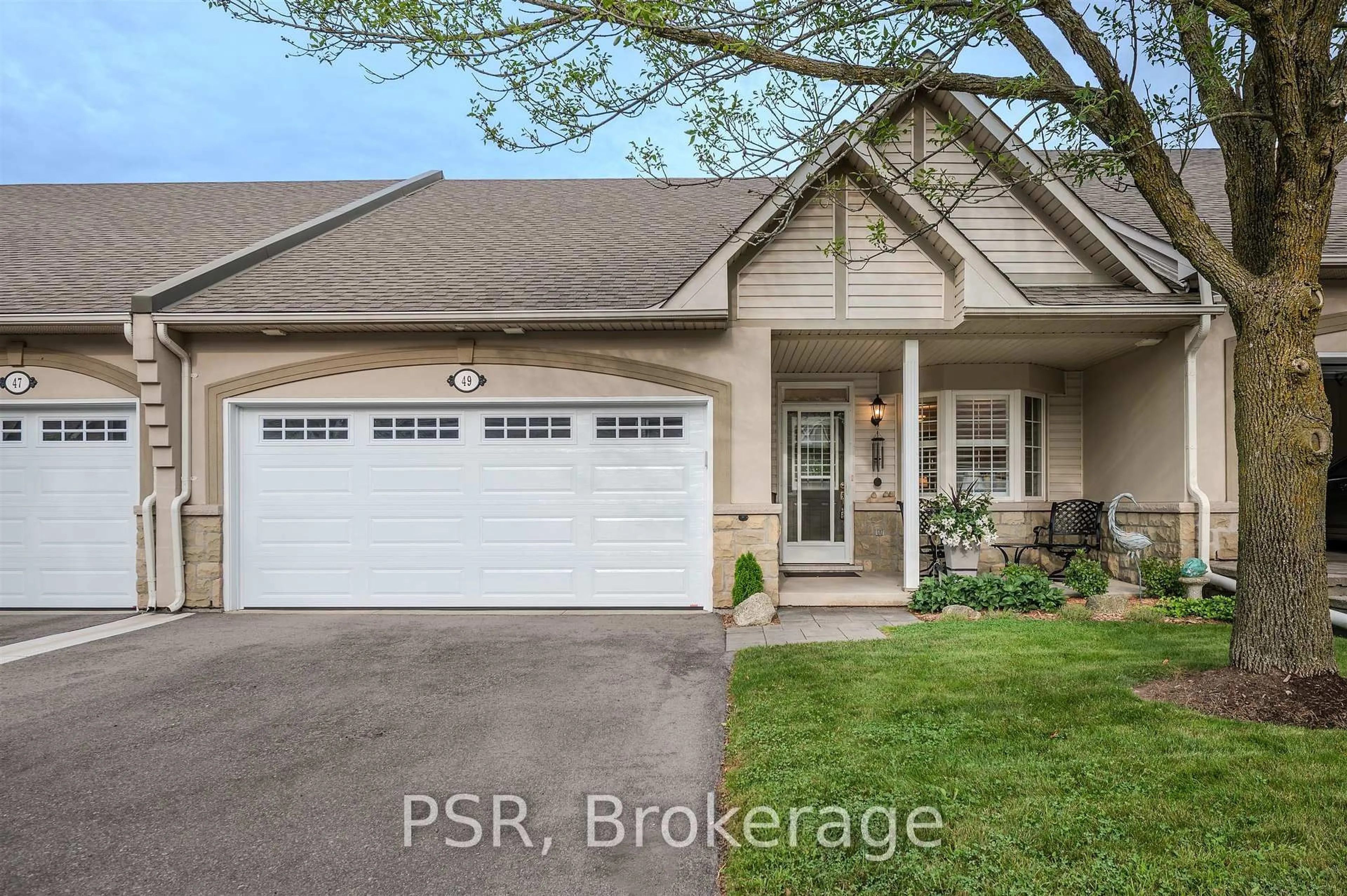 Home with brick exterior material, street for 212 Stonehenge Dr #49, Hamilton Ontario L9K 1N4
