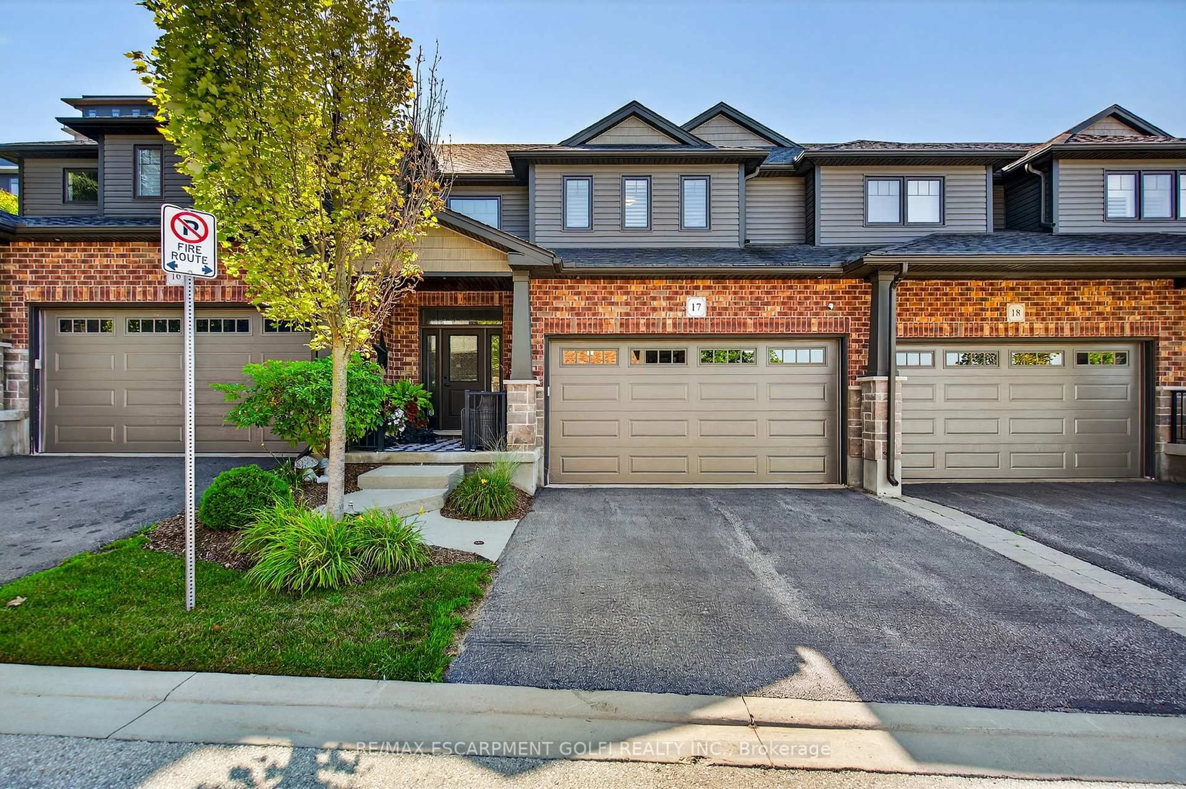 Home with brick exterior material, street for 254 Gosling Gdns #17, Guelph Ontario N1L 0M4