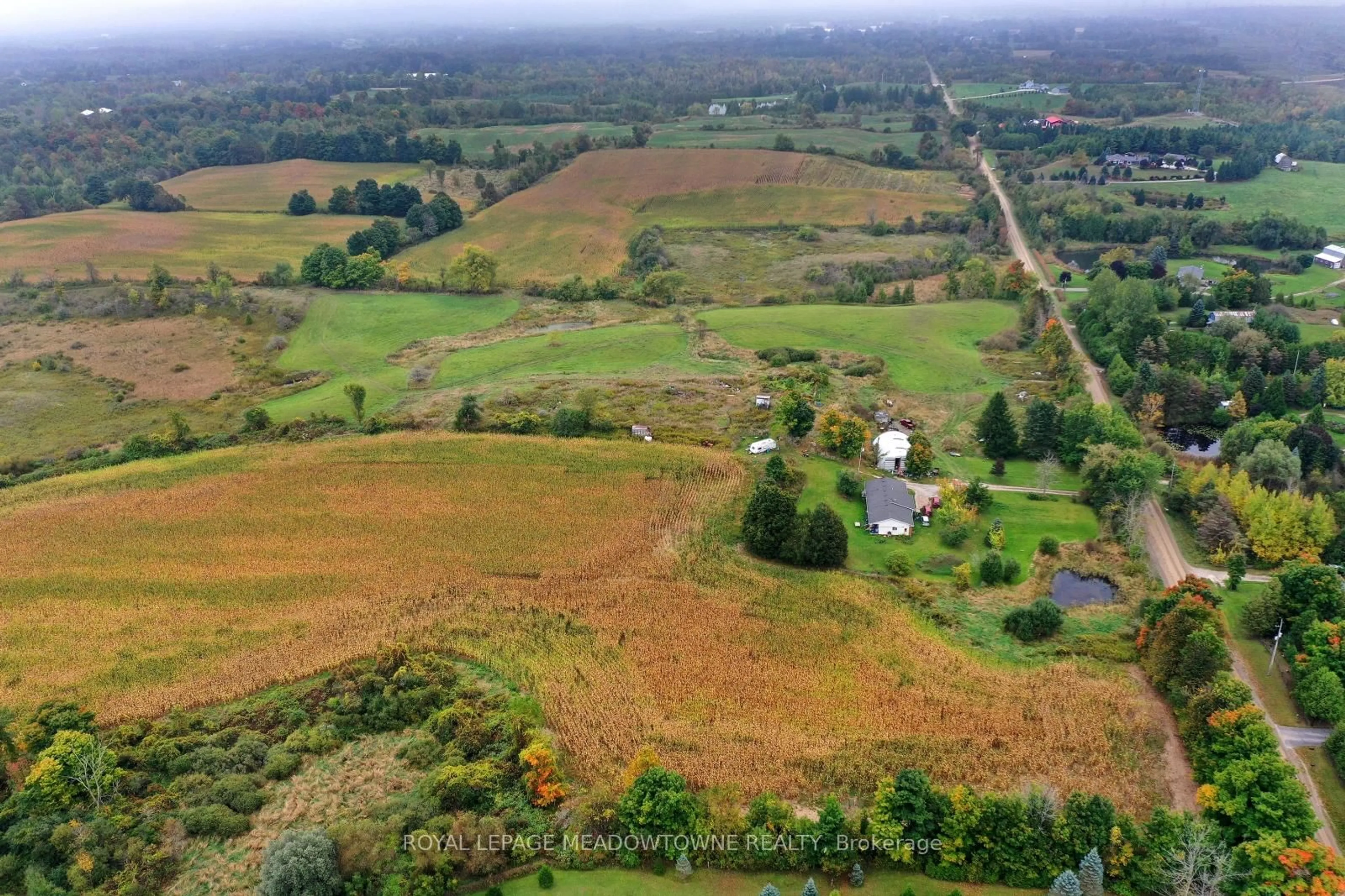 A pic from outside/outdoor area/front of a property/back of a property/a pic from drone, mountain view for 5167 Fifth Line, Erin Ontario N0B 1T0