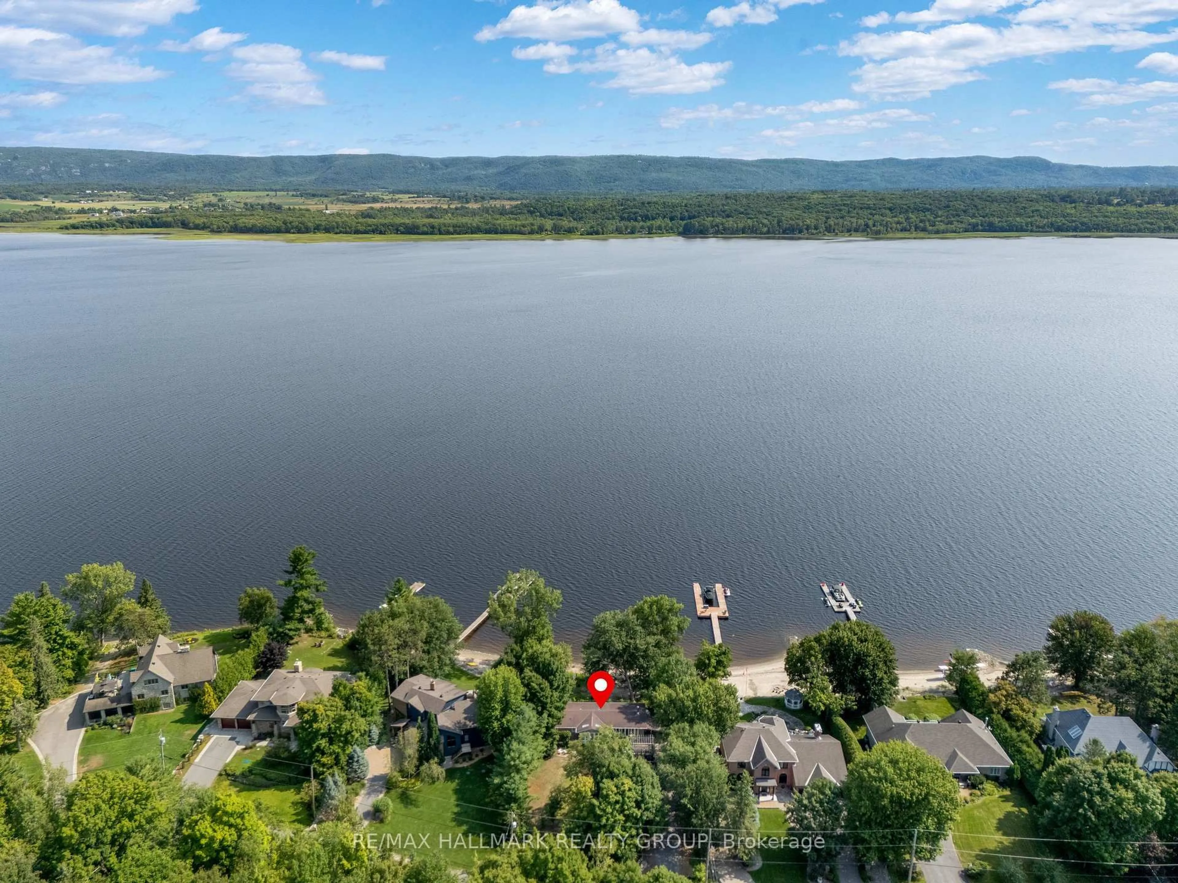 A pic from outside/outdoor area/front of a property/back of a property/a pic from drone, water/lake/river/ocean view for 2860 Barlow Cres, Ottawa Ontario K0A 1T0