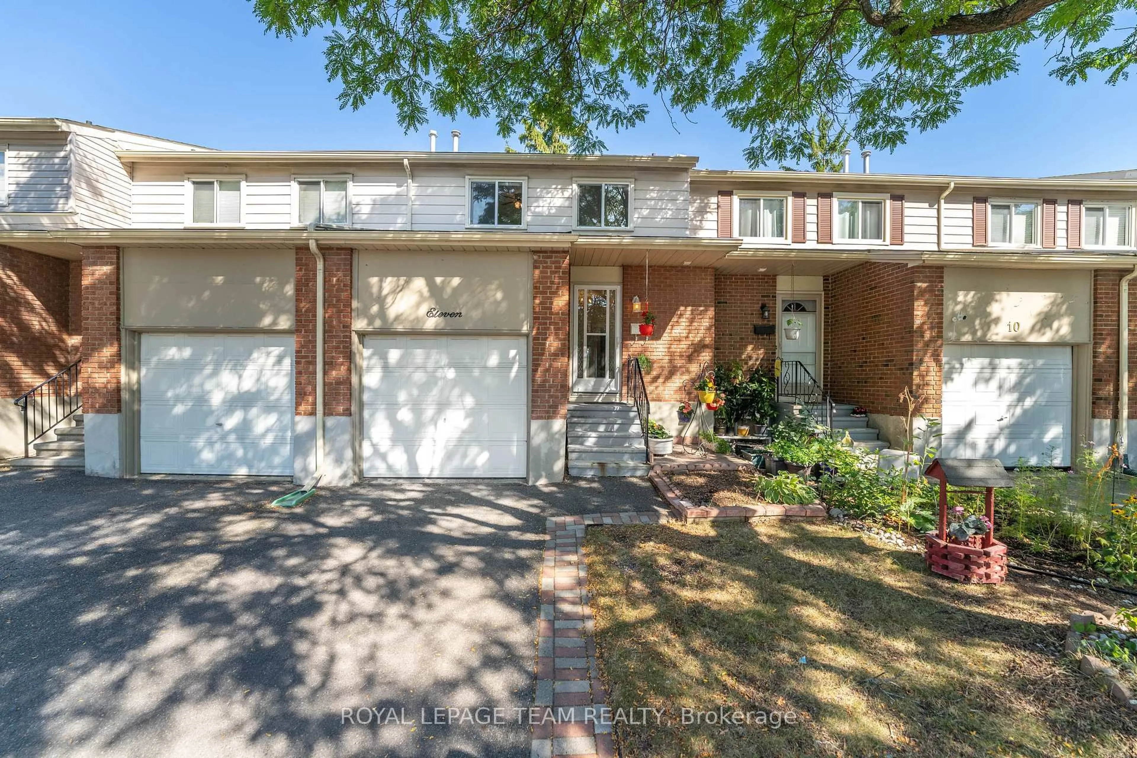 Home with brick exterior material, street for 2415 SOUTHVALE Cres #11, Ottawa Ontario K1B 4T9