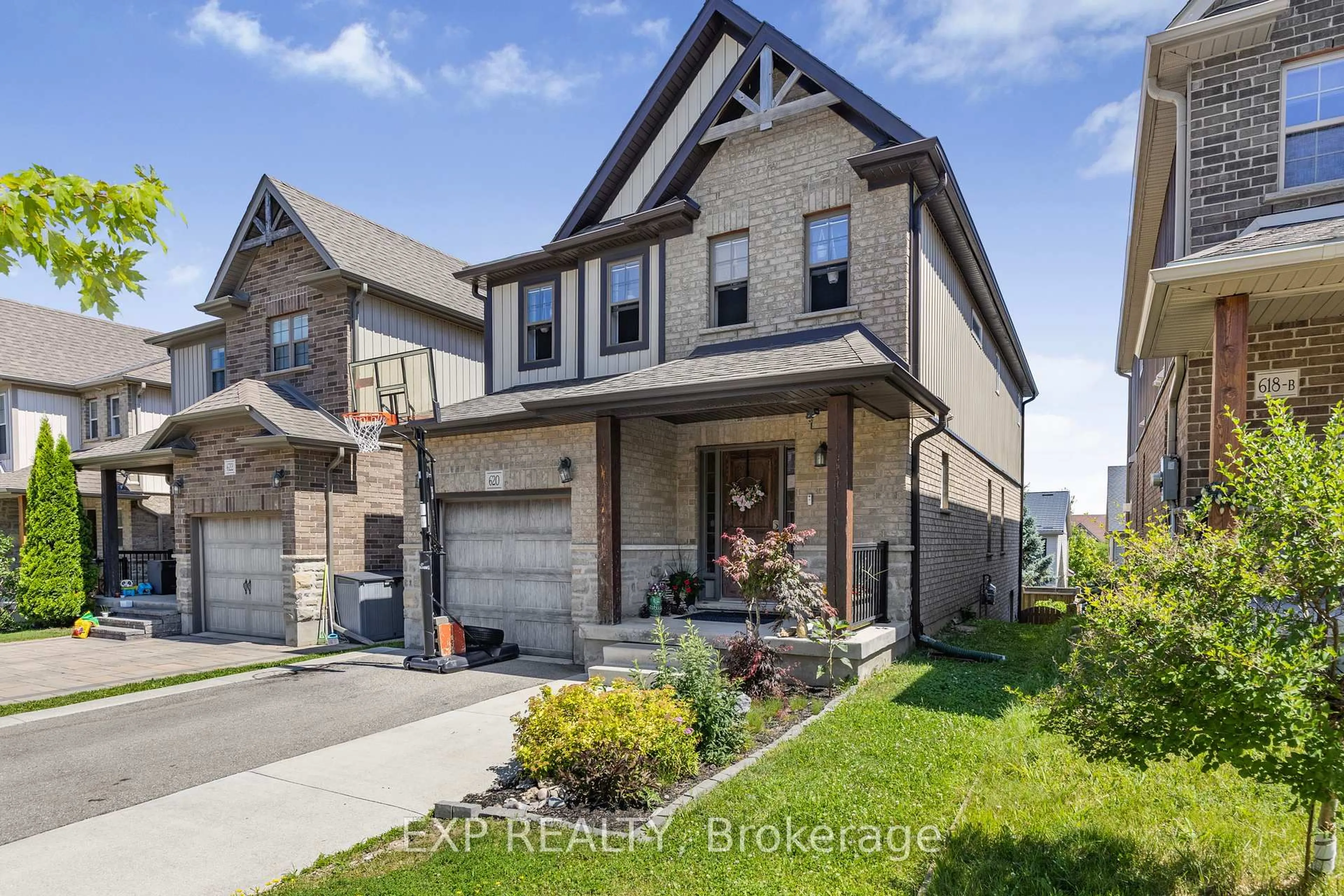 Home with brick exterior material, street for 620 Montpellier Dr, Waterloo Ontario N2T 0B2