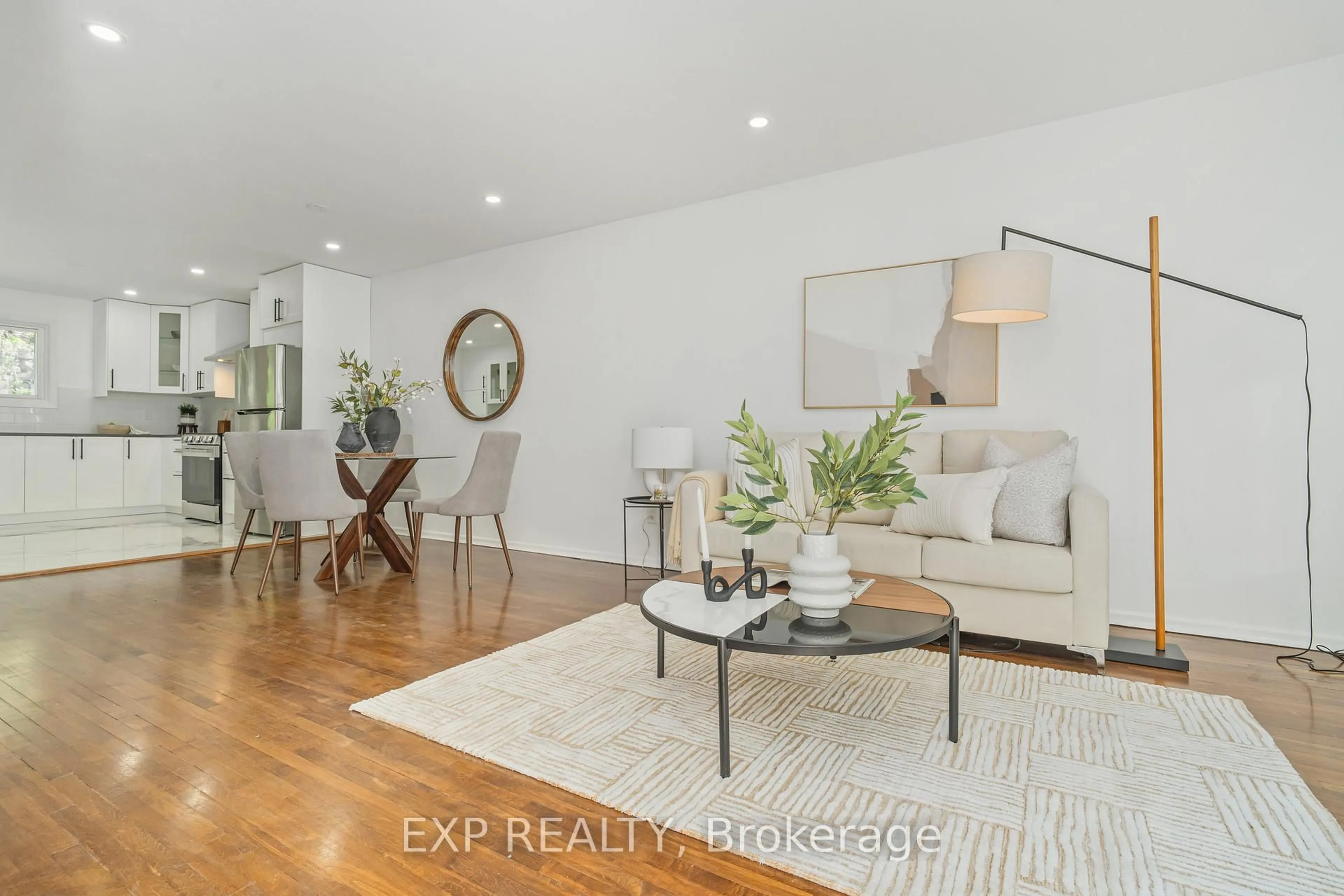 Living room with furniture, wood/laminate floor for 1510 Lepage Ave, Ottawa Ontario K1Z 8C9
