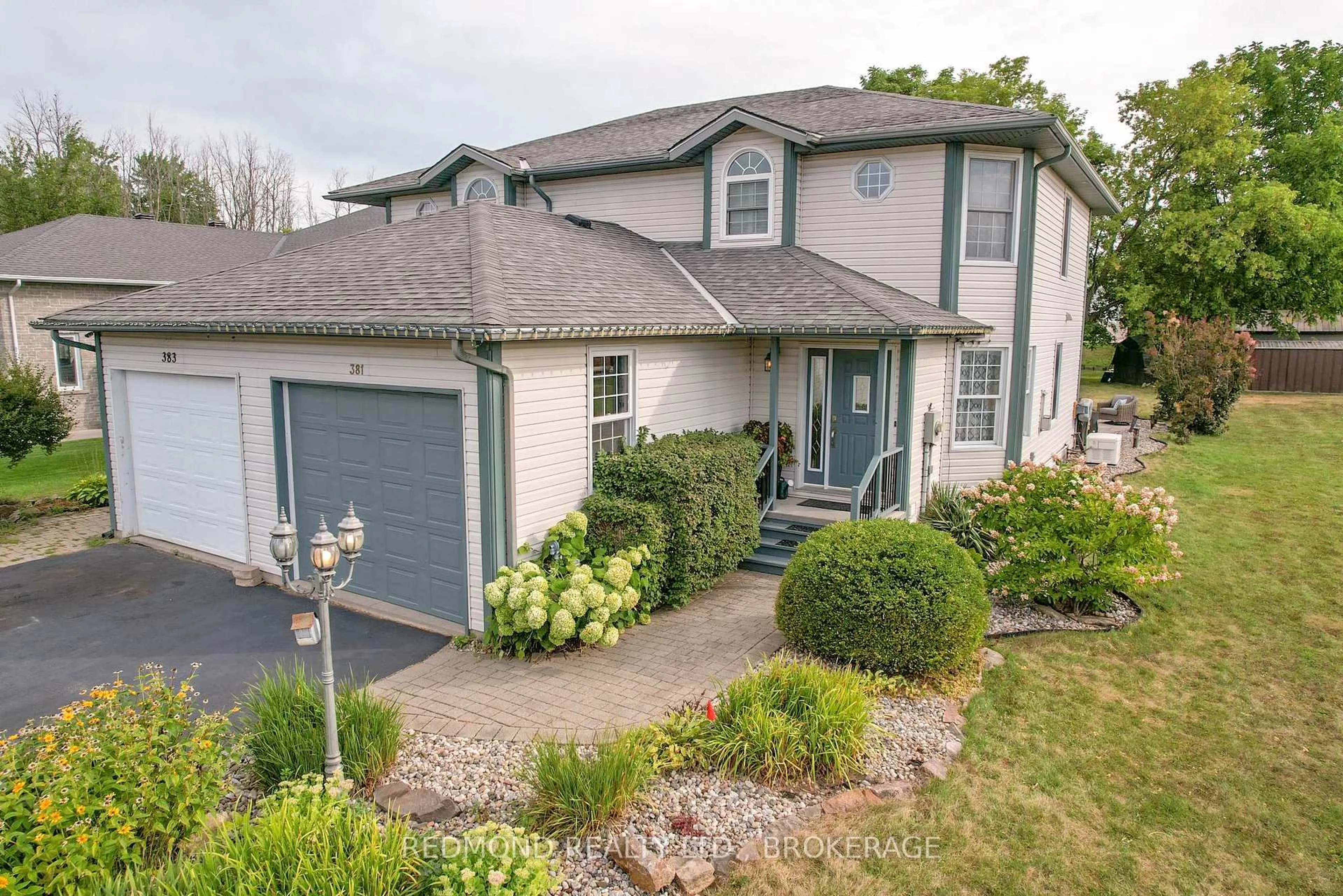 Home with vinyl exterior material, street for 381 James St, Gananoque Ontario K7G 3E8