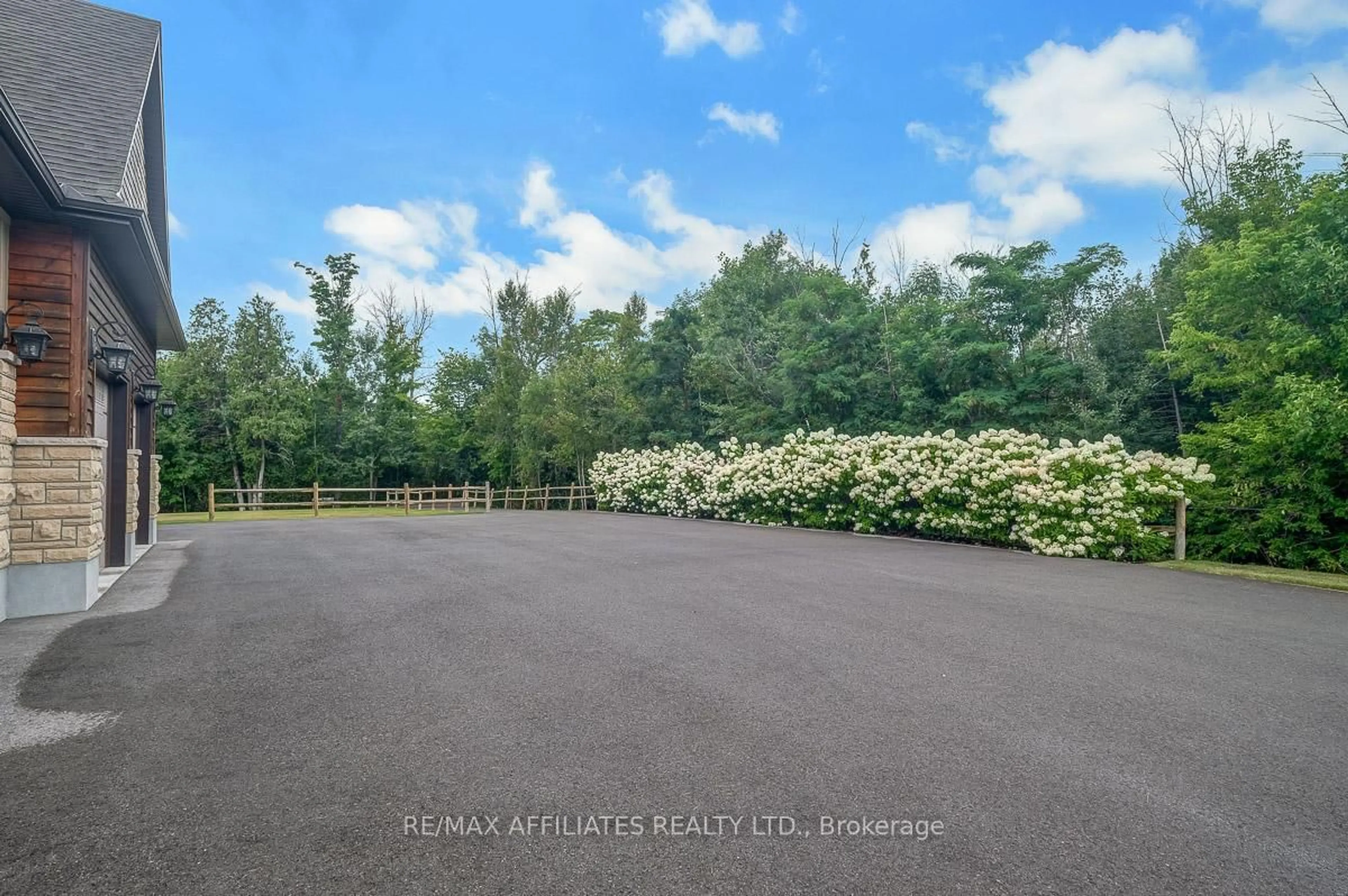 A pic from outside/outdoor area/front of a property/back of a property/a pic from drone, forest/trees view for 111 Ironstone Crt, Stittsville Ontario K2S 0L4