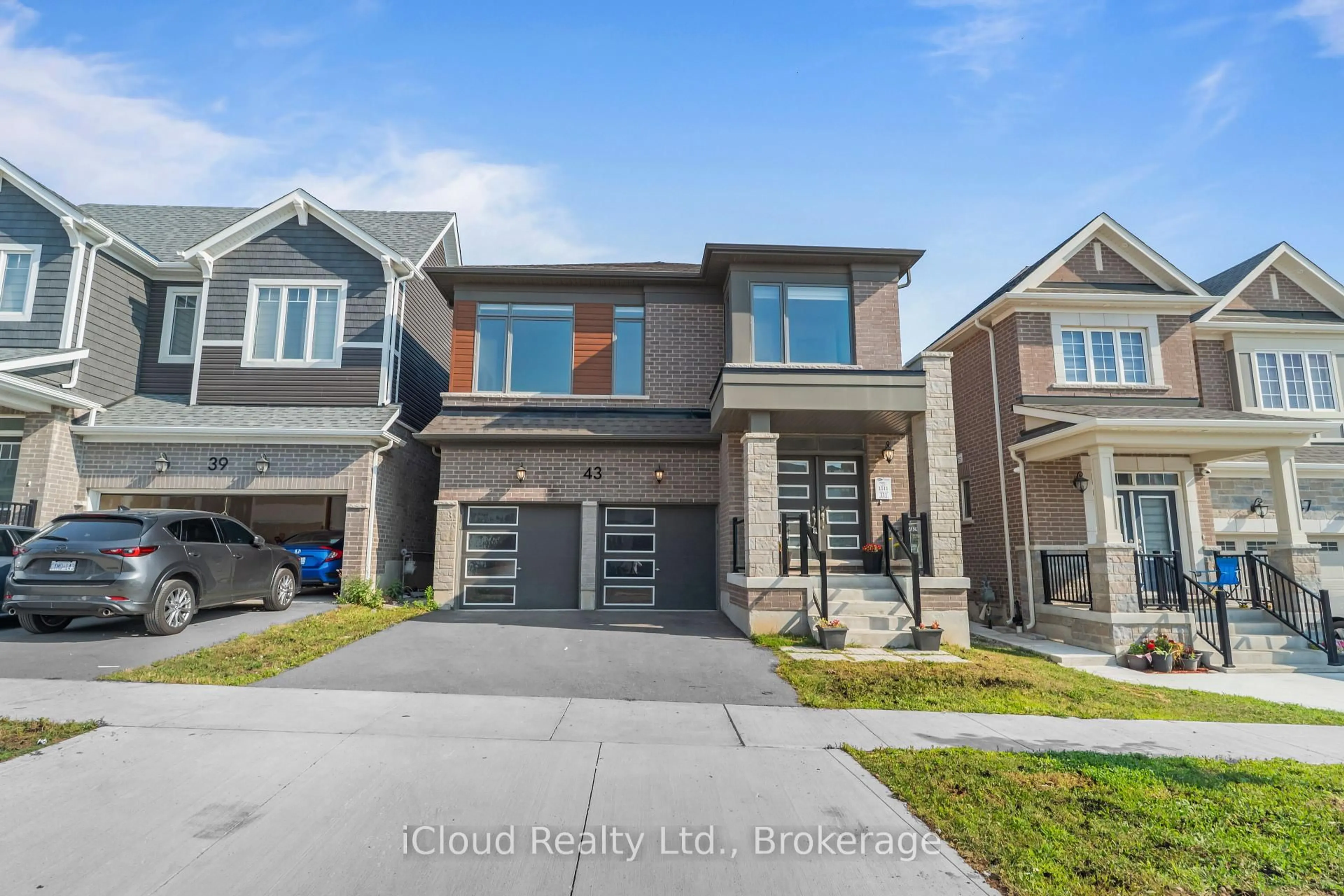Home with brick exterior material, street for 43 William Nador St, Kitchener Ontario N2E 3X8
