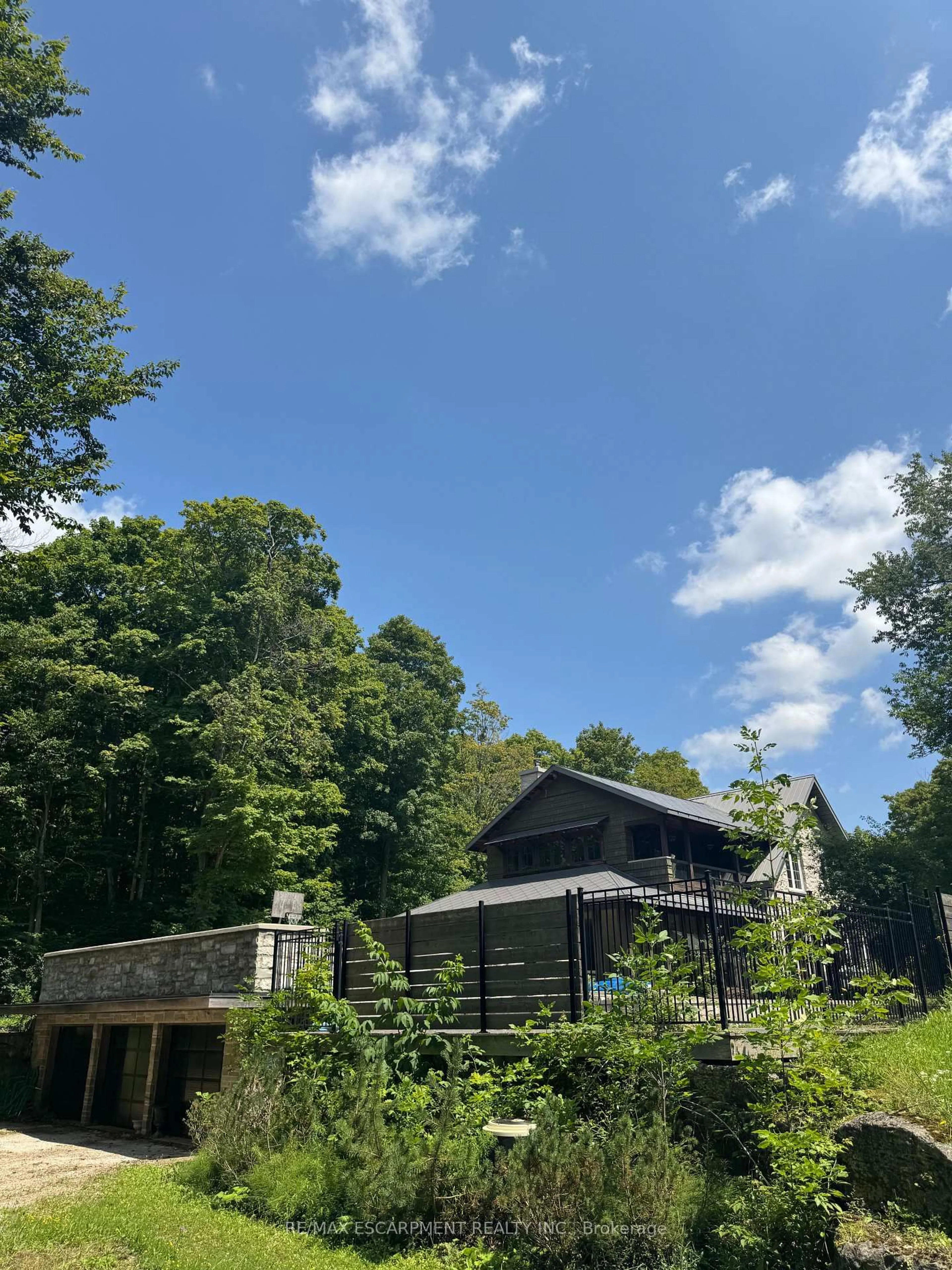 A pic from outside/outdoor area/front of a property/back of a property/a pic from drone, forest/trees view for 517807 5th Concession Rd, Meaford Ontario N4K 5W4