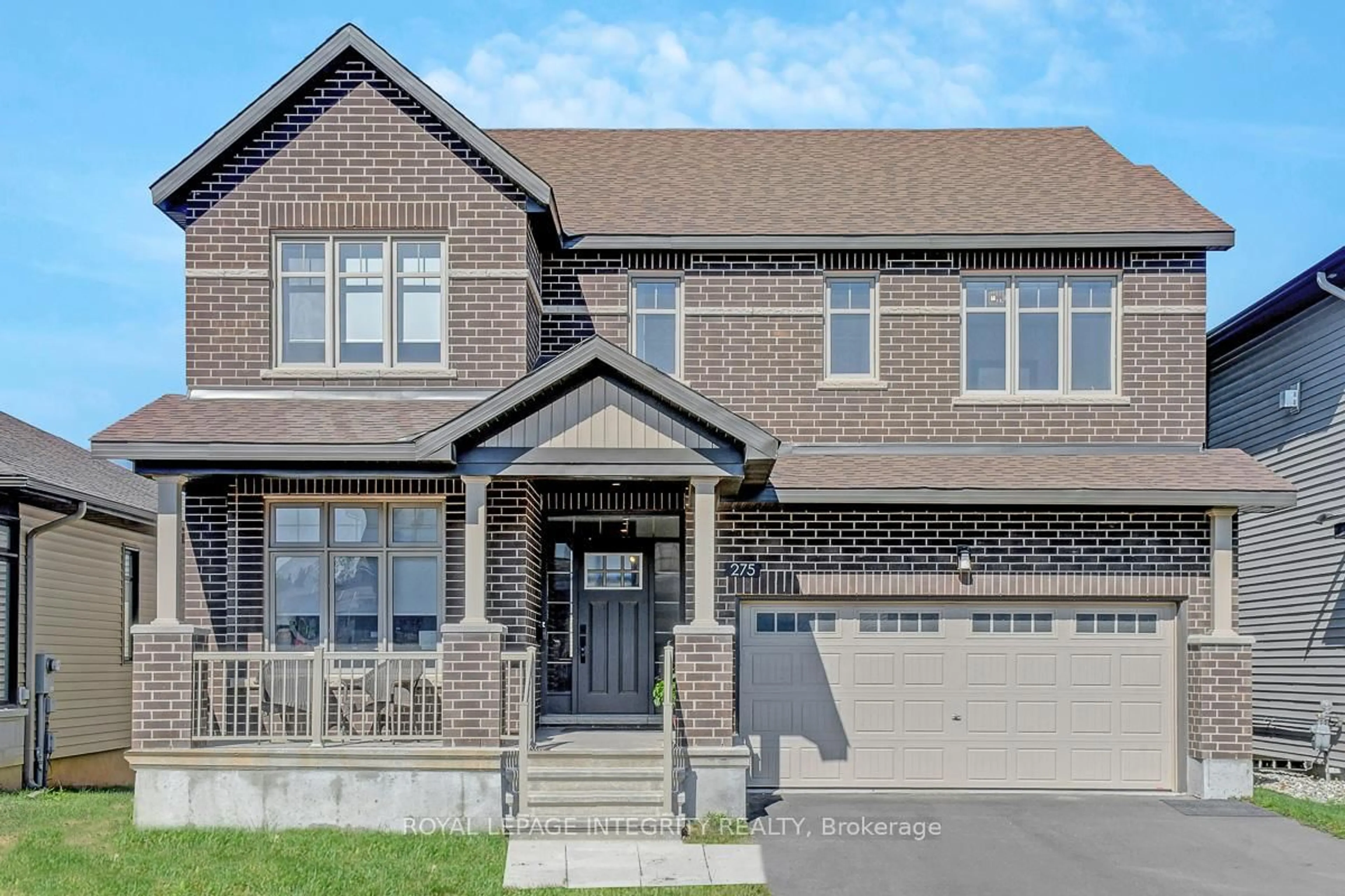 Home with brick exterior material, street for 275 Ginebik Way, Ottawa Ontario K1X 0H5
