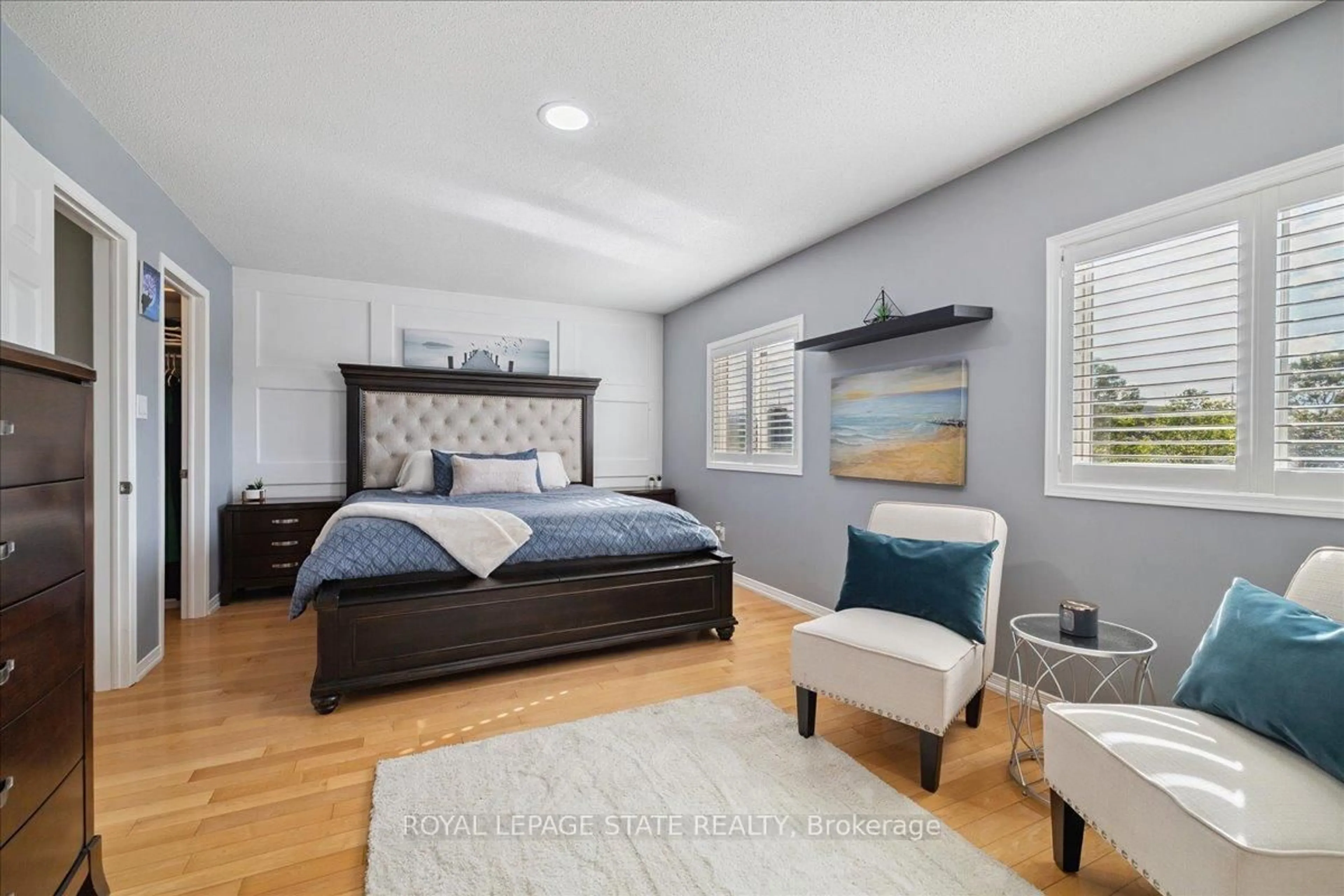 Bedroom with bed, wood/laminate floor for 42 Meadow Wood Cres, Hamilton Ontario L8J 3Z8