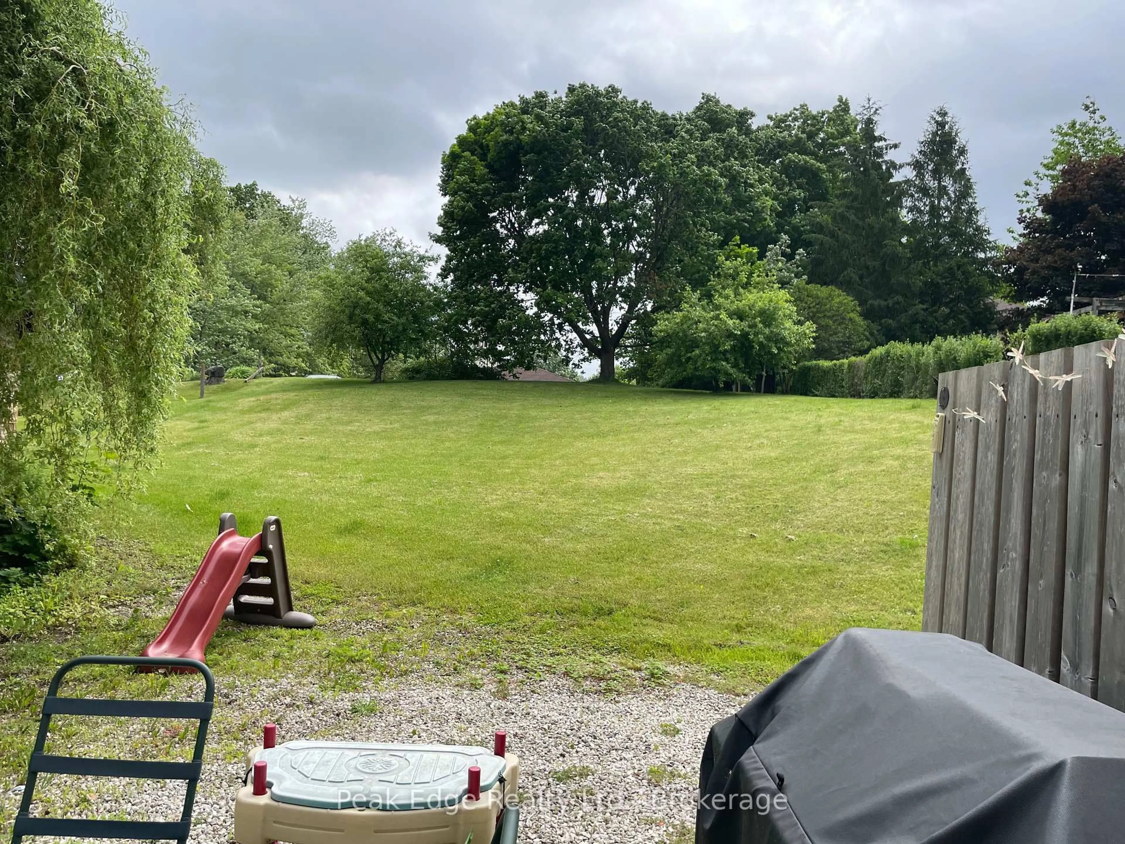 A pic from outside/outdoor area/front of a property/back of a property/a pic from drone, forest/trees view for 541 Mill St, West Grey Ontario N0G 2M0