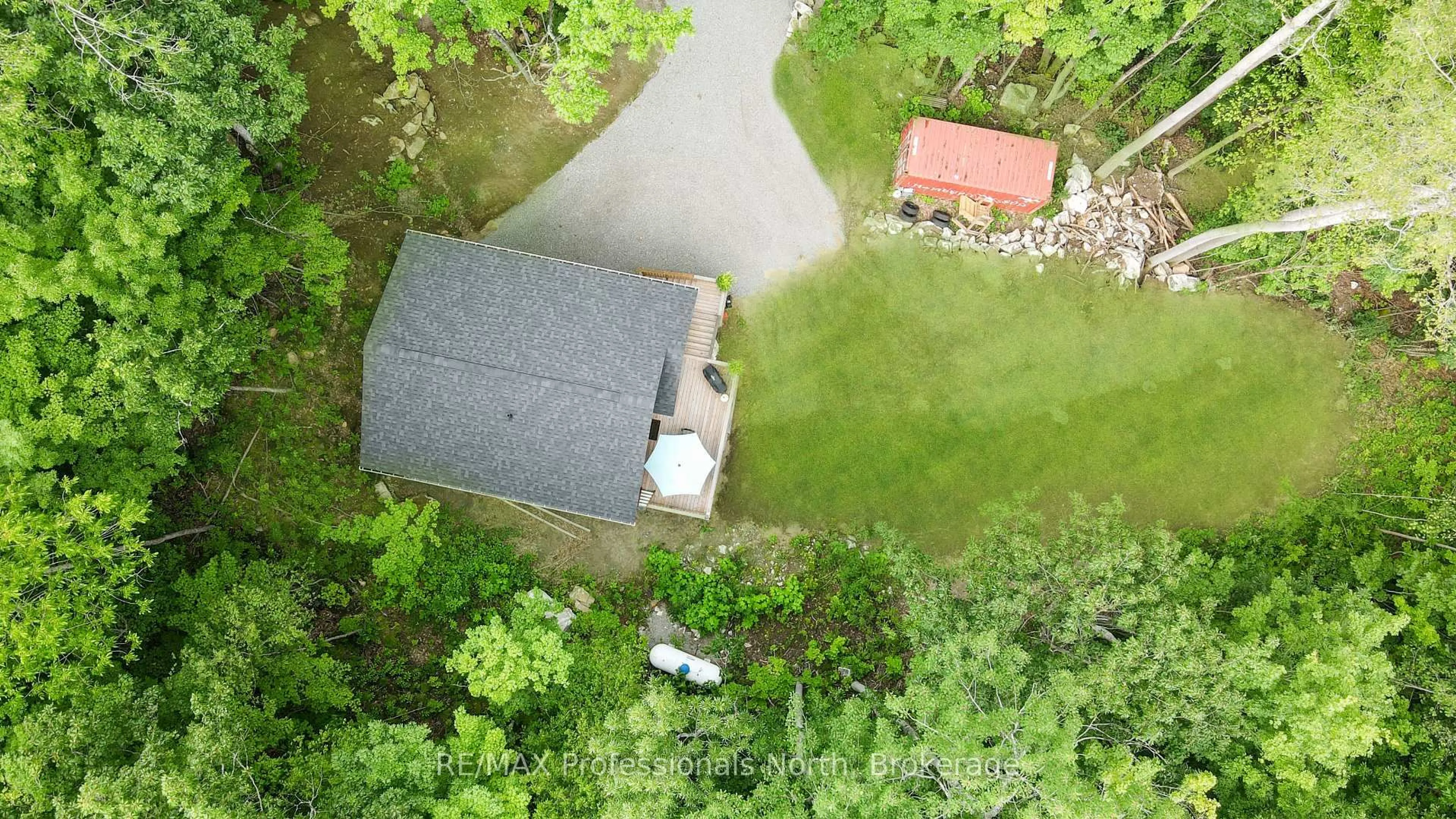 A pic from outside/outdoor area/front of a property/back of a property/a pic from drone, unknown for 1065 Hendersons Rd, Minden Hills Ontario K0M 2K0