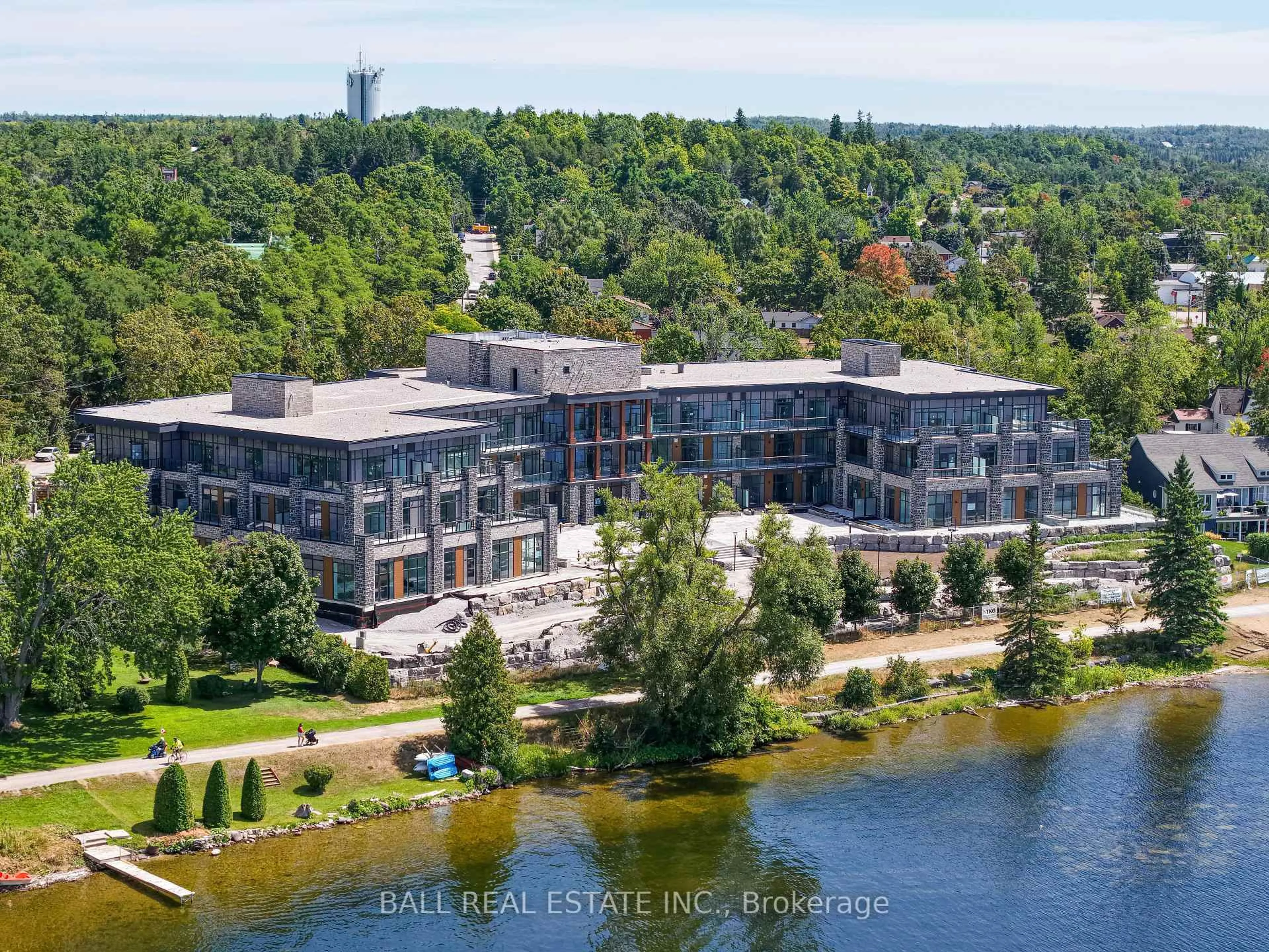 A pic from outside/outdoor area/front of a property/back of a property/a pic from drone, water/lake/river/ocean view for 99 Louisa St #107, Kawartha Lakes Ontario K0M 1N0