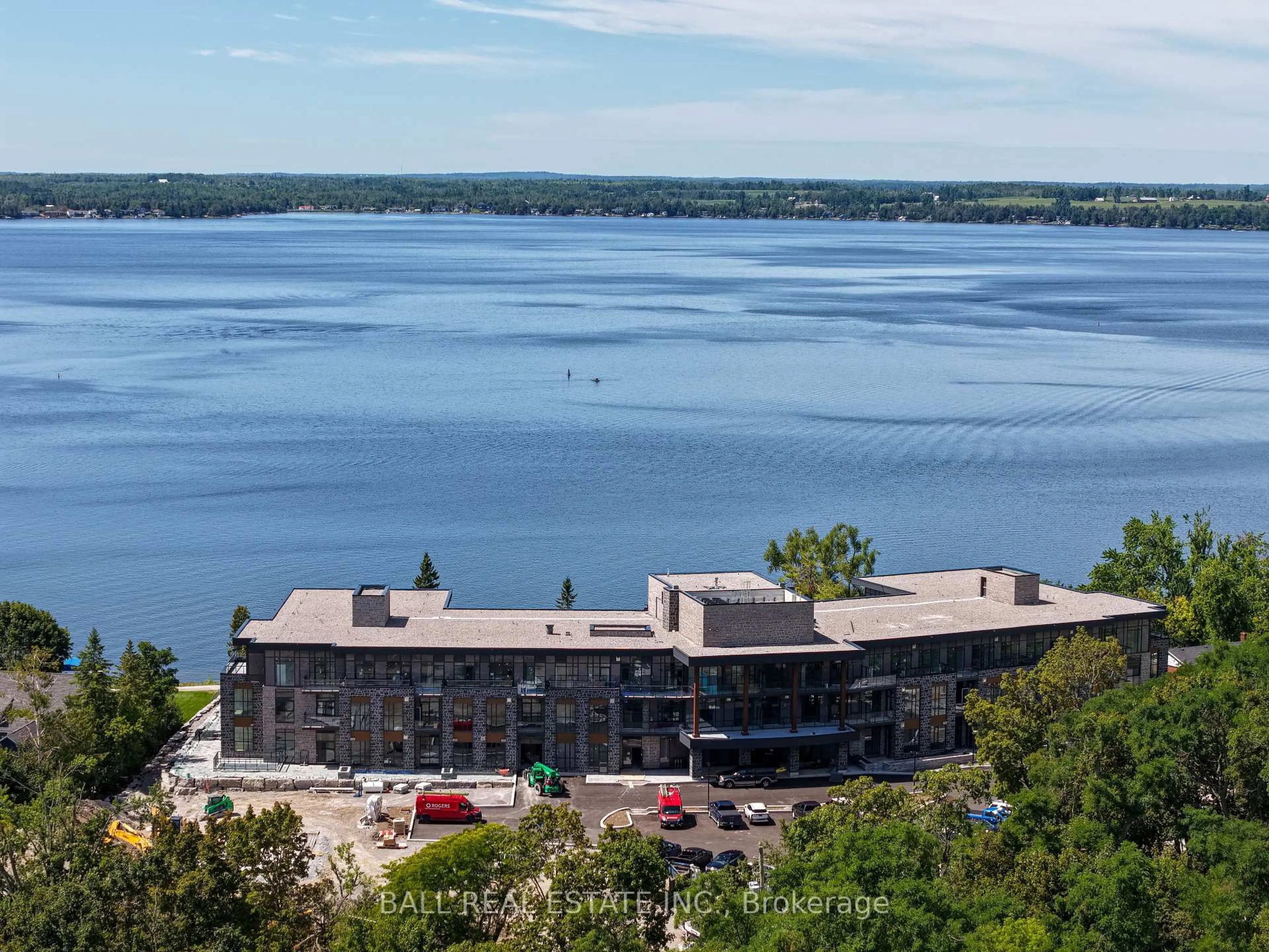 A pic from outside/outdoor area/front of a property/back of a property/a pic from drone, water/lake/river/ocean view for 99 Louisa St #107, Kawartha Lakes Ontario K0M 1N0