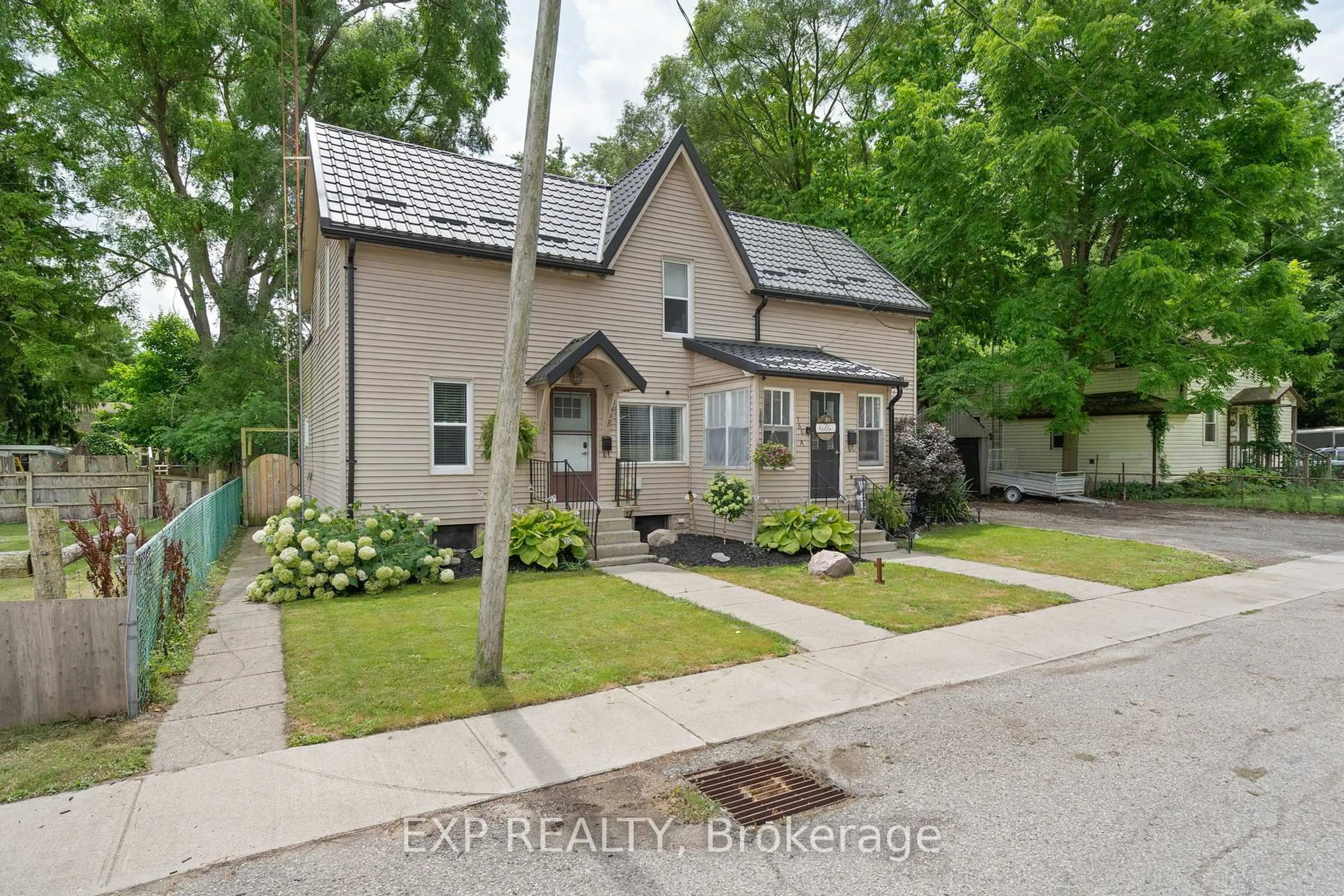 A pic from outside/outdoor area/front of a property/back of a property/a pic from drone, street for 166 Mehring Ave, West Elgin Ontario N0L 2P0
