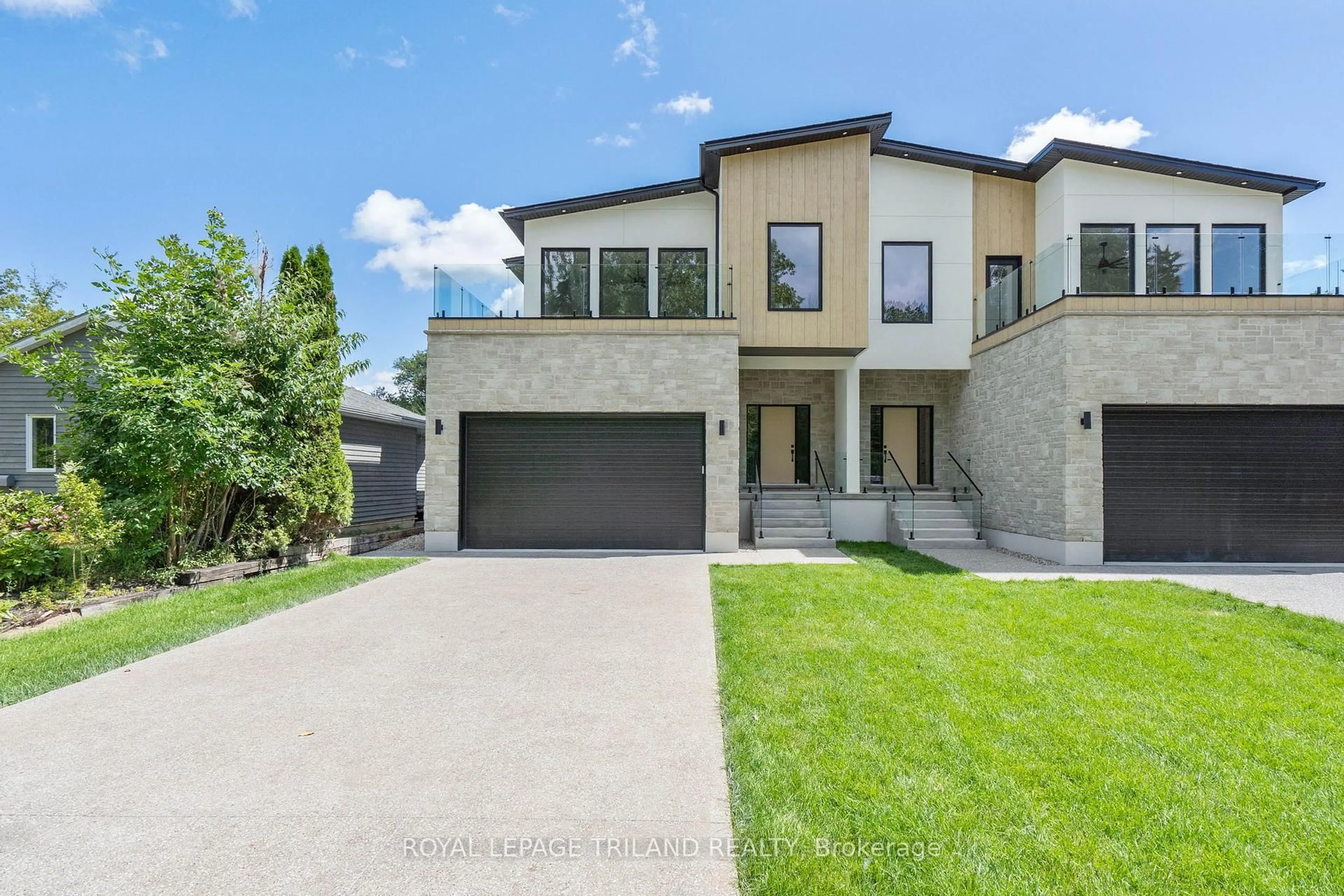 Home with brick exterior material, street for 32 Alberta St, Lambton Shores Ontario N0M 1T0