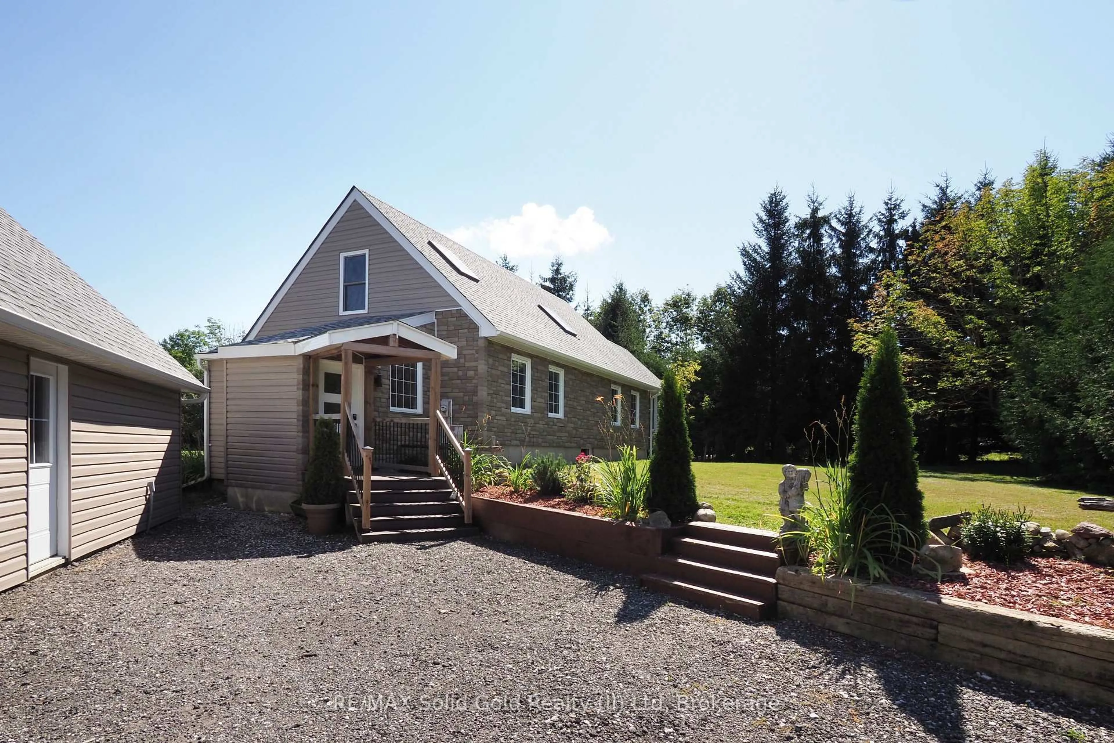 A pic from outside/outdoor area/front of a property/back of a property/a pic from drone, street for 7201 Highway 6, Mapleton Ontario N0G 1A0