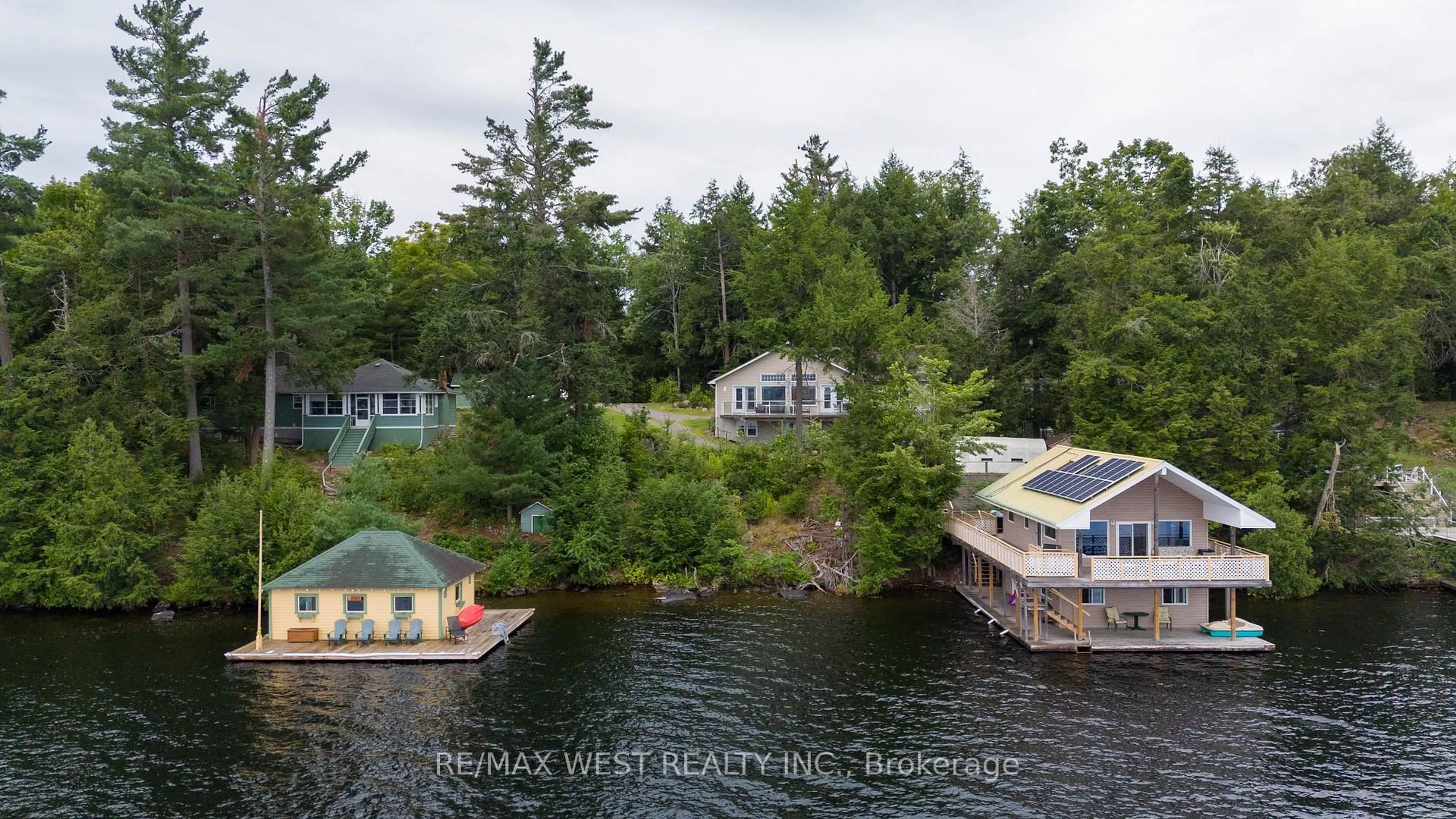A pic from outside/outdoor area/front of a property/back of a property/a pic from drone, water/lake/river/ocean view for 2982 Muskoka Road 169, Muskoka Lakes Ontario P0C 1M0